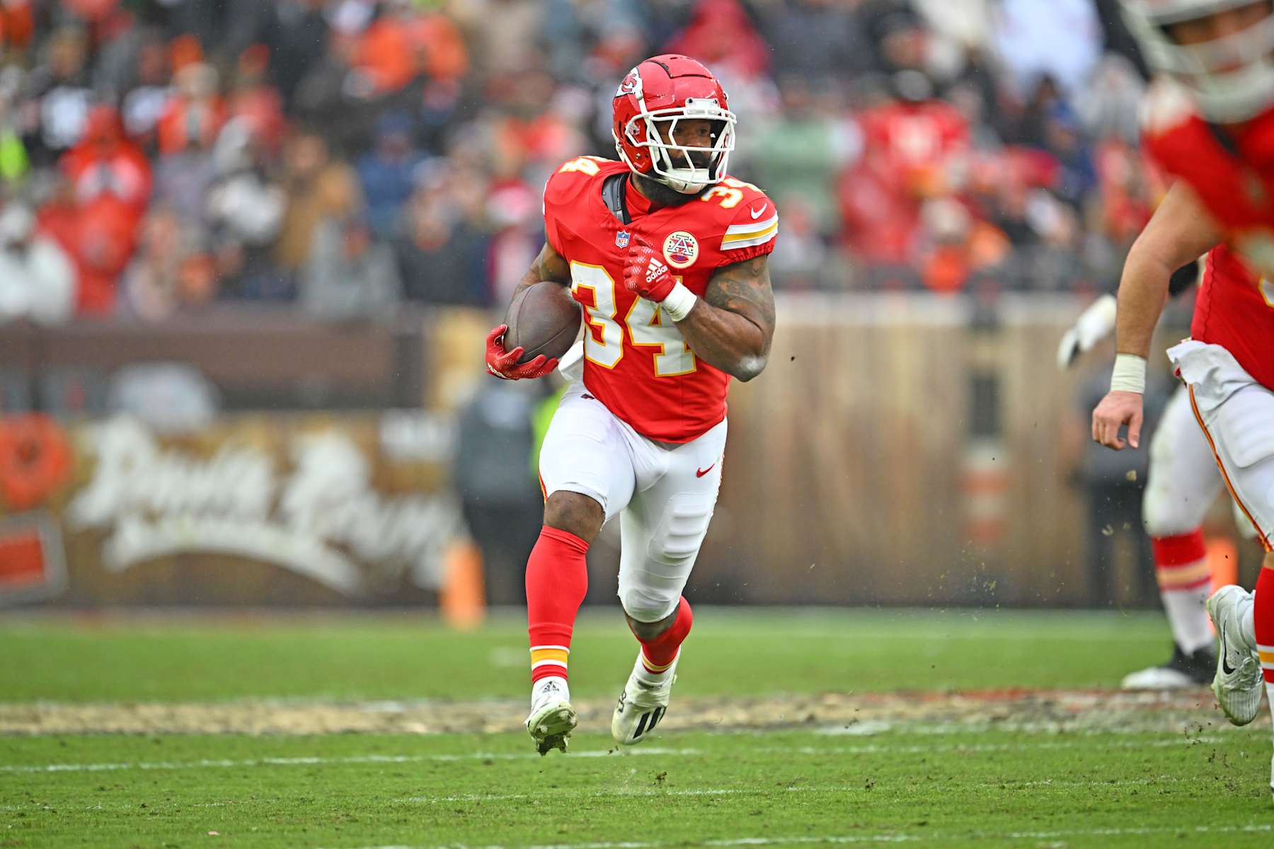 CLEVELAND, OHIO - DECEMBER 15: Samaje Perine #34 of the Kansas City Chiefs carries the ball against the Cleveland Browns during the second quarter at Huntington Bank Field on December 15, 2024 in Cleveland, Ohio. (Photo by Jason Miller/Getty Images)