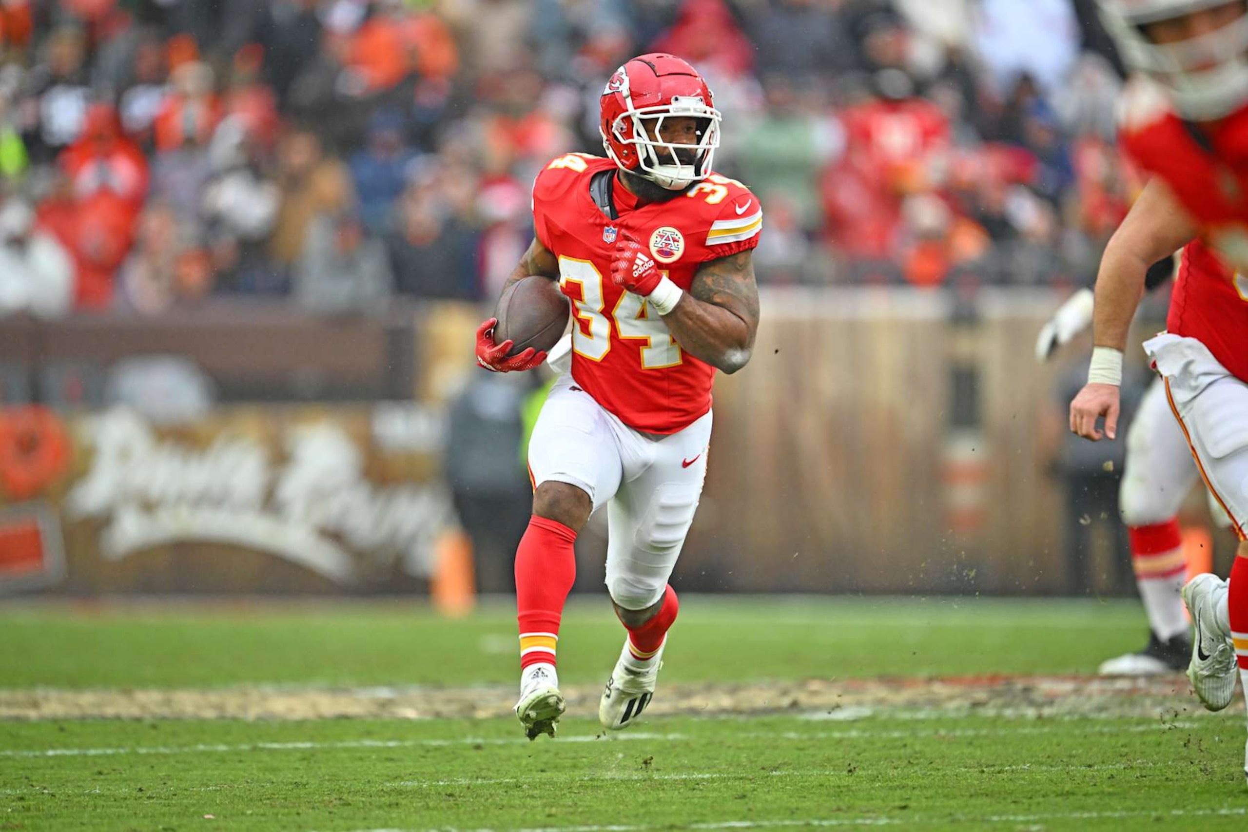 CLEVELAND, OHIO - DECEMBER 15: Samaje Perine #34 of the Kansas City Chiefs carries the ball against the Cleveland Browns during the second quarter at Huntington Bank Field on December 15, 2024 in Cleveland, Ohio. (Photo by Jason Miller/Getty Images)