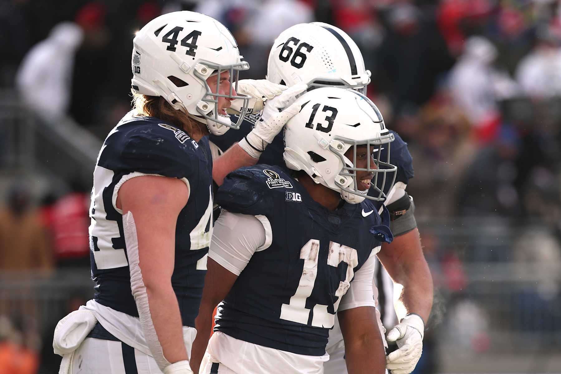 STATE COLLEGE, PENNSYLVANIA - DECEMBER 21: Kaytron Allen #13 of the Penn State Nittany Lions celebrates with teammates after scoring a touchdown during the fourth quarter against the Southern Methodist Mustangs in the Playoff First Round Game at Beaver Stadium on December 21, 2024 in State College, Pennsylvania. (Photo by Scott Taetsch/Getty Images)