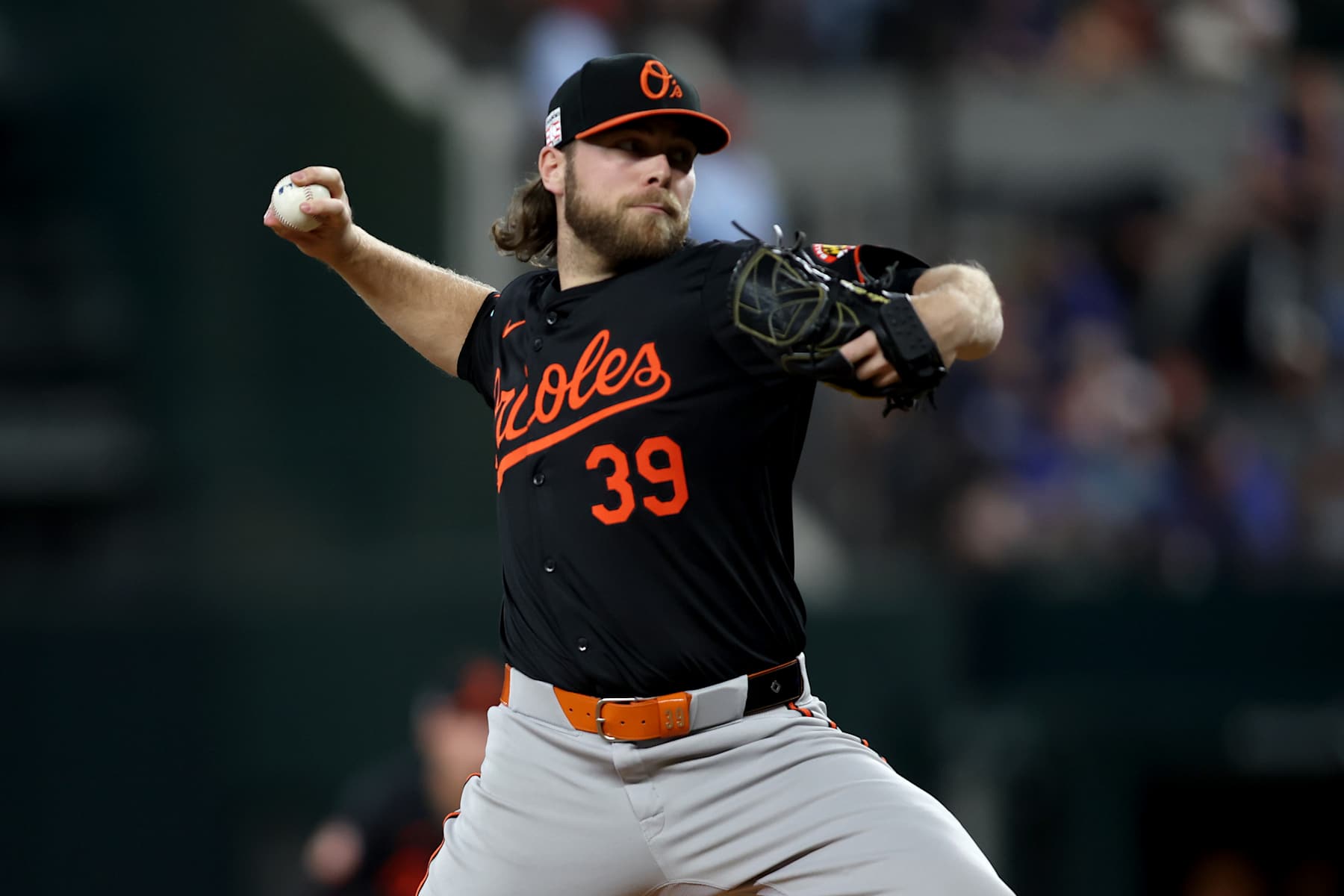 ARLINGTON, TEXAS - JULY 19: Corbin Burnes #39 of the Baltimore Orioles throws a pitch in the first inning against the Texas Rangers at Globe Life Field on July 19, 2024 in Arlington, Texas. (Photo by Tim Heitman/Getty Images)