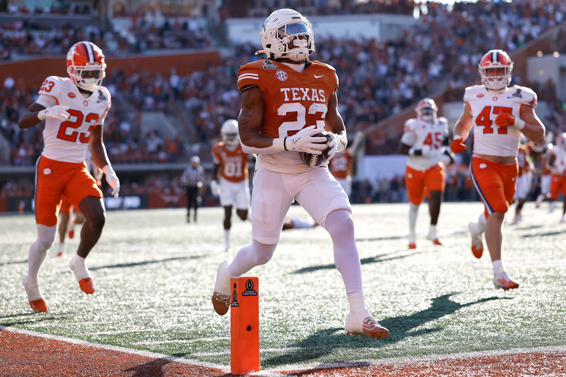 AUSTIN, TEXAS - DECEMBER 21: Jaydon Blue #23 of the Texas Longhorns runs the ball for a touchdown during the second quarter against the Clemson Tigers in the Playoff First Round Game at Darrell K Royal-Texas Memorial Stadium on December 21, 2024 in Austin, Texas. (Photo by Tim Warner/Getty Images)