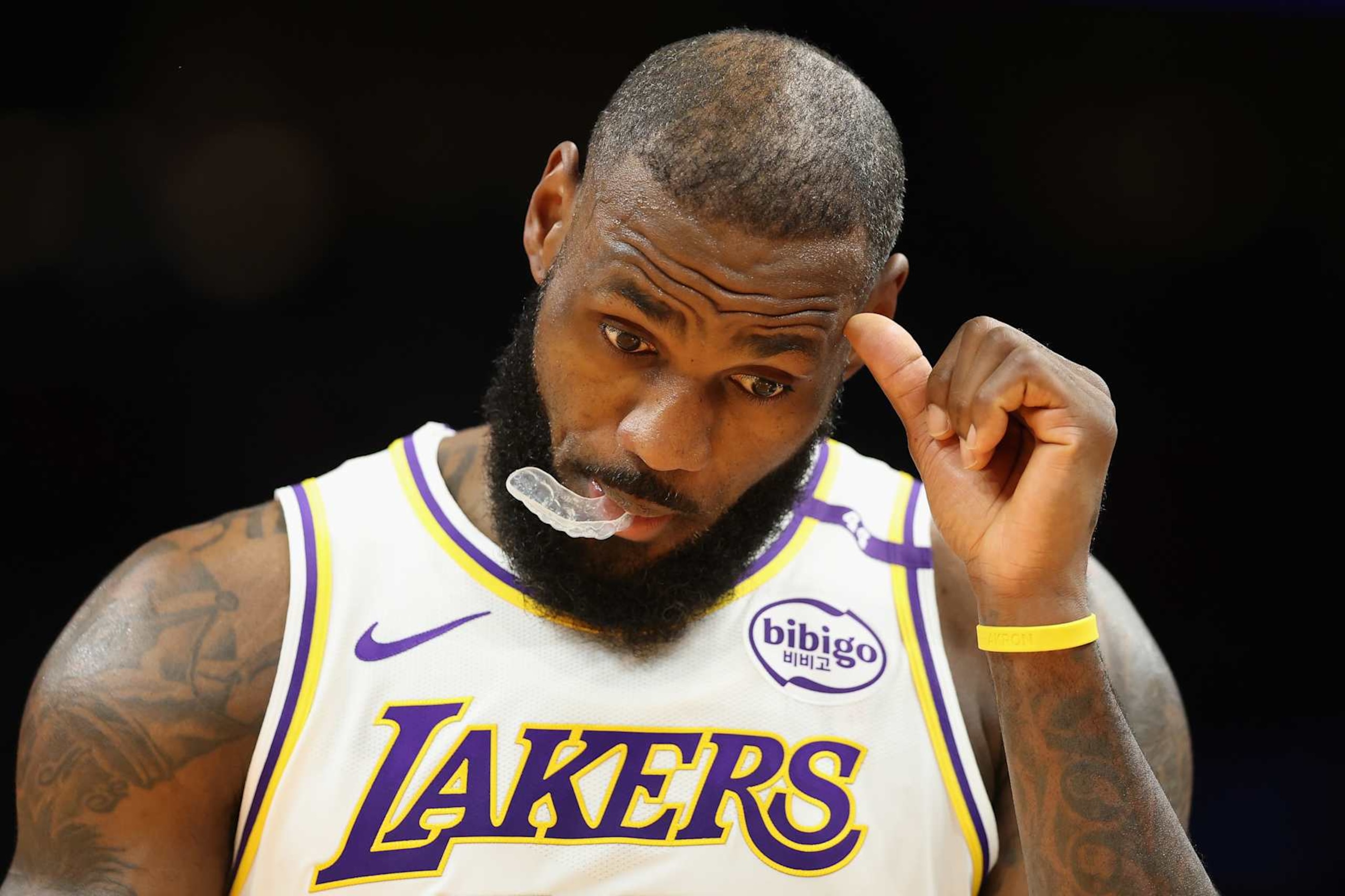 PHOENIX, ARIZONA - NOVEMBER 26: LeBron James #23 of the Los Angeles Lakers reacts during the first half of the Emirates NBA Cup game against the Phoenix Suns at Footprint Center on November 26, 2024 in Phoenix, Arizona. NOTE TO USER: User expressly acknowledges and agrees that, by downloading and/or using this photograph, user is consenting to the terms and conditions of the Getty Images License Agreement. (Photo by Christian Petersen/Getty Images)