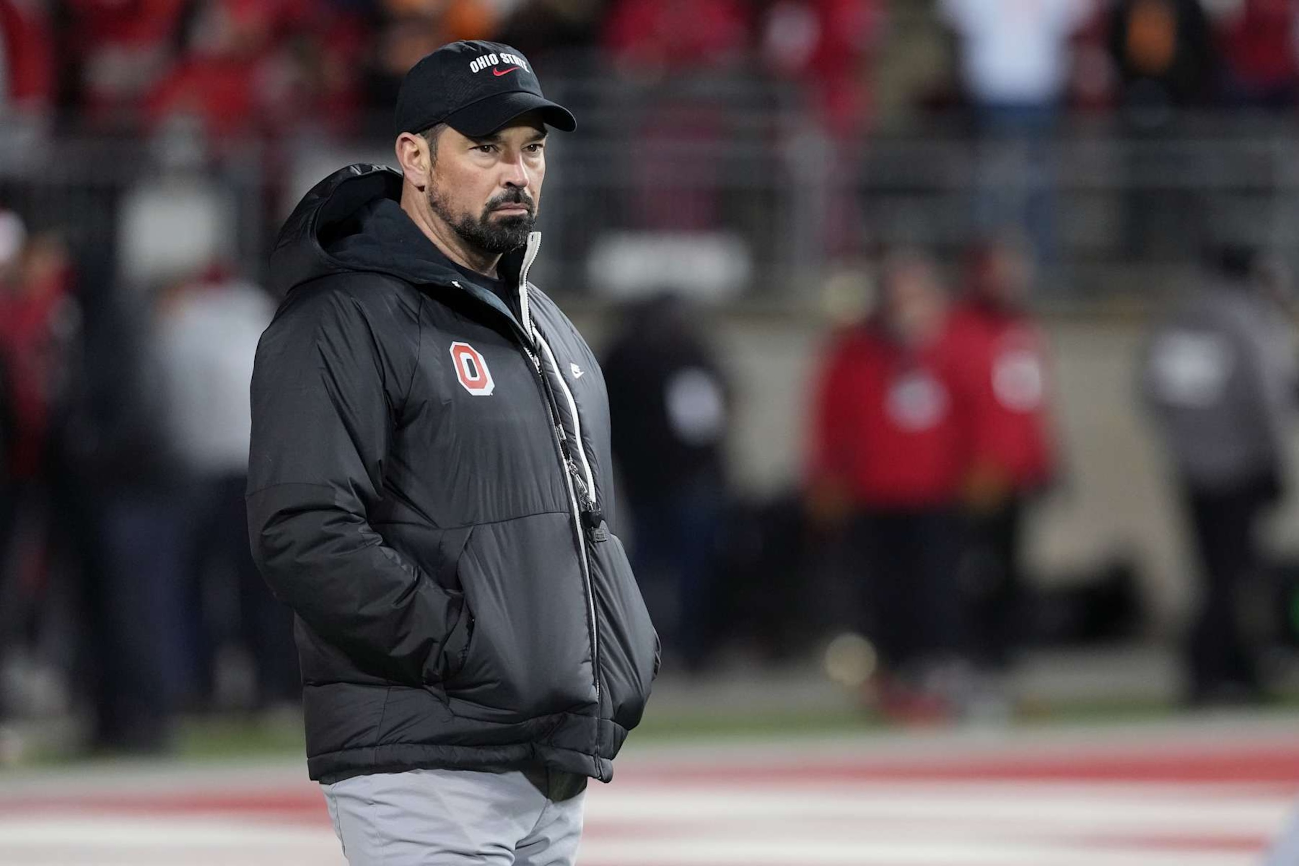 COLUMBUS, OHIO - DECEMBER 21: Head coach Ryan Day of the Ohio State Buckeyes looks on before the game against the Tennessee Volunteers in the Playoff First Round Game at Ohio Stadium on December 21, 2024 in Columbus, Ohio. (Photo by Jason Mowry/Getty Images) COLUMBUS, OHIO - DECEMBER 21: Head coach Ryan Day of the Ohio State Buckeyes looks on before the game against the Tennessee Volunteers in the Playoff First Round Game at Ohio Stadium on December 21, 2024 in Columbus, Ohio. (Photo by Jason Mowry/Getty Images)