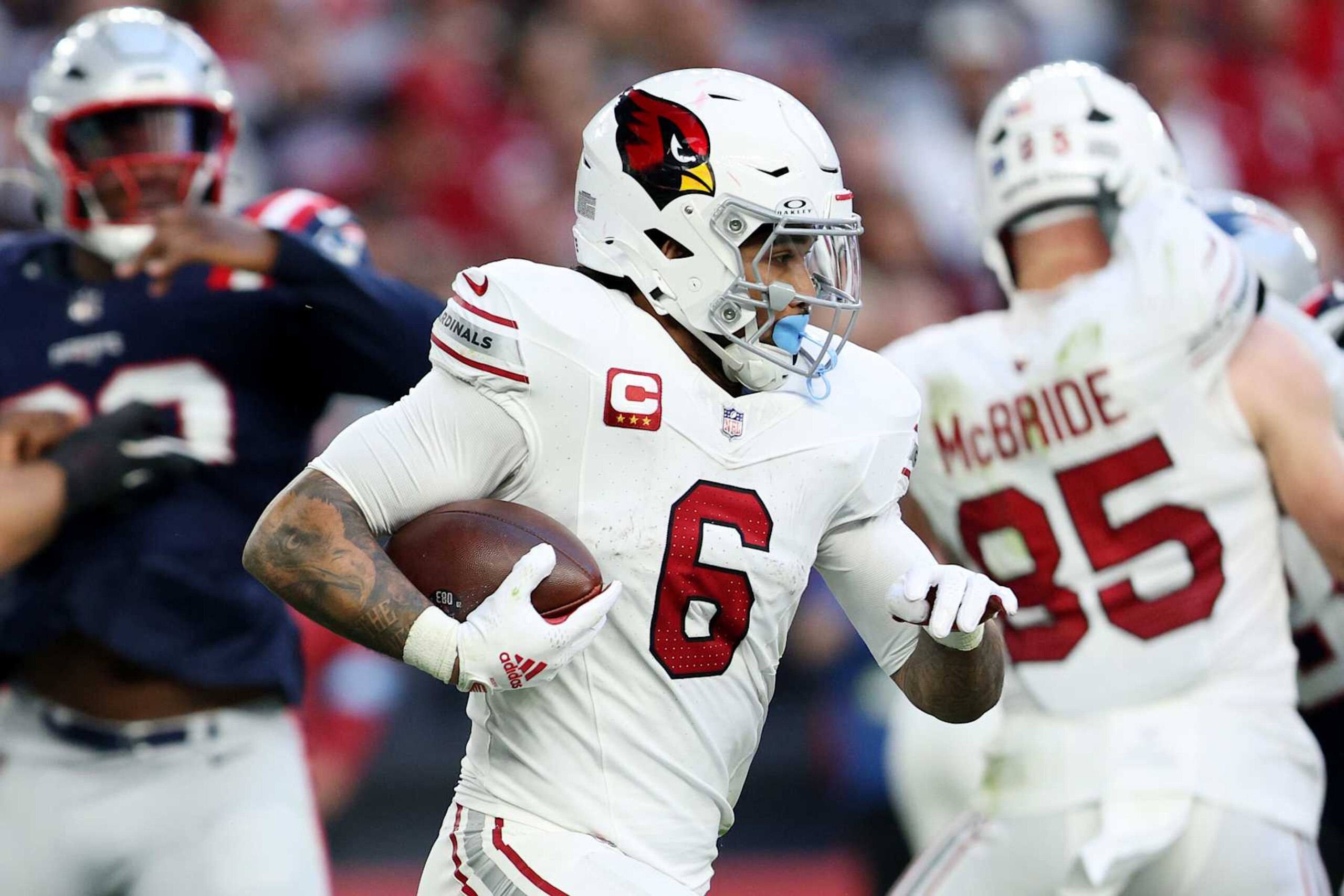GLENDALE, ARIZONA - DECEMBER 15: James Conner #6 of the Arizona Cardinals runs with the ball against the New England Patriots in the third quarter at State Farm Stadium on December 15, 2024 in Glendale, Arizona. (Photo by Mike Christy/Getty Images)