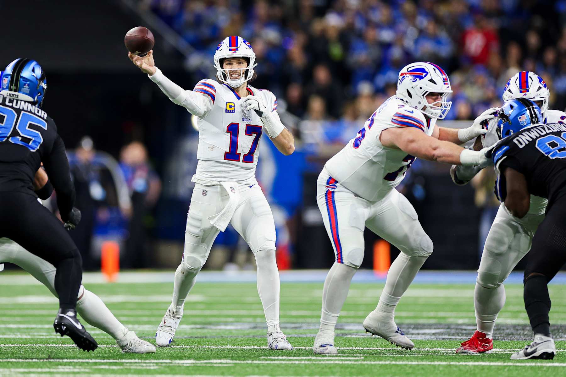 DETROIT, MICHIGAN - DECEMBER 15: Josh Allen #17 of the Buffalo Bills throws a pass in the first quarter of a game against the Detroit Lions at Ford Field on December 15, 2024 in Detroit, Michigan. (Photo by Mike Mulholland/Getty Images)