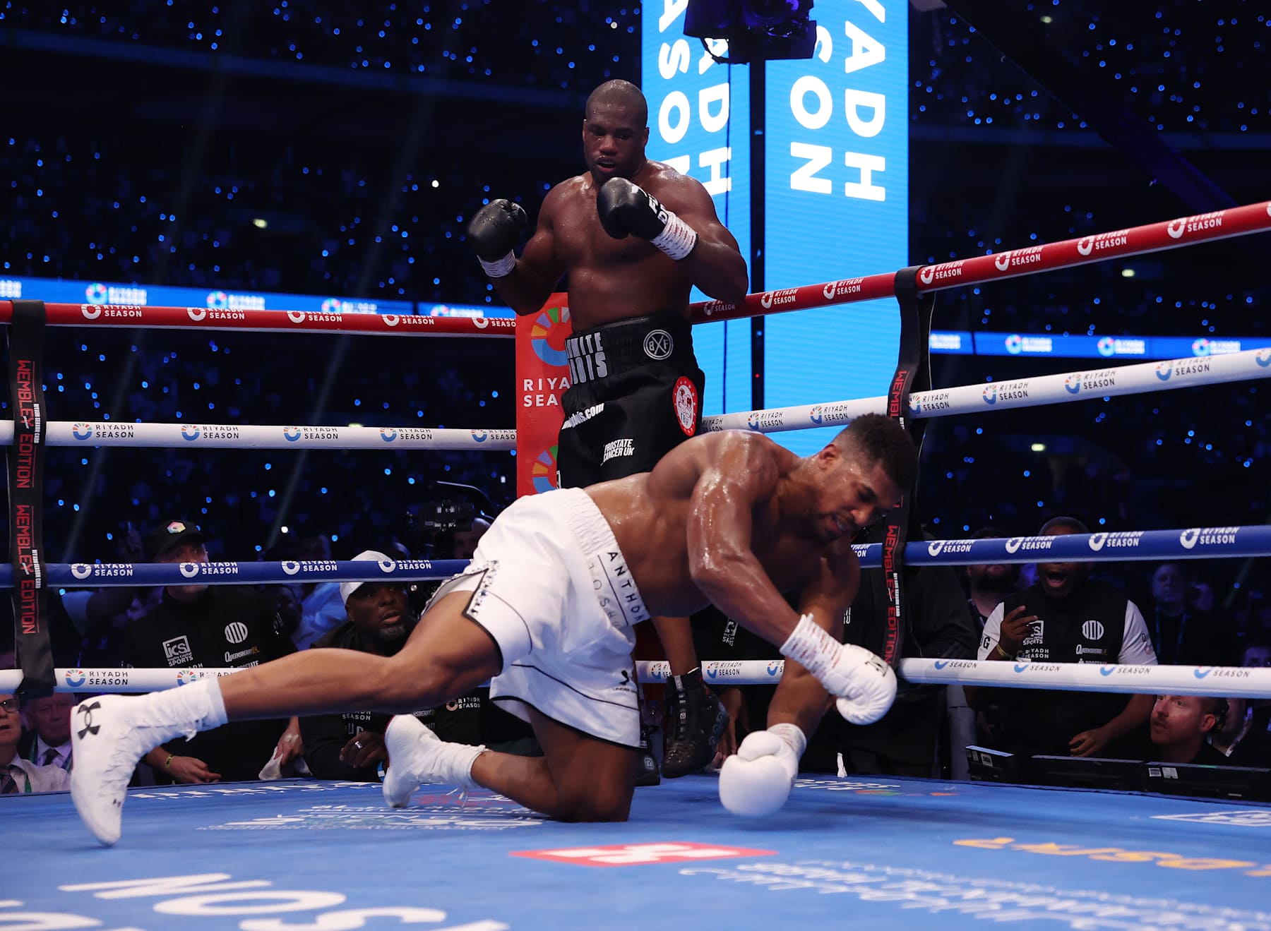 LONDON, ENGLAND - SEPTEMBER 21: Daniel Dubois stands as Anthony Joshua goes down during their IBF World Heavyweight Title fight at the Riyadh Season  - Wembley Edition card at Wembley Stadium on September 21, 2024 in London, England. (Photo by Mark Robinson/Matchroom Boxing/Getty Images)