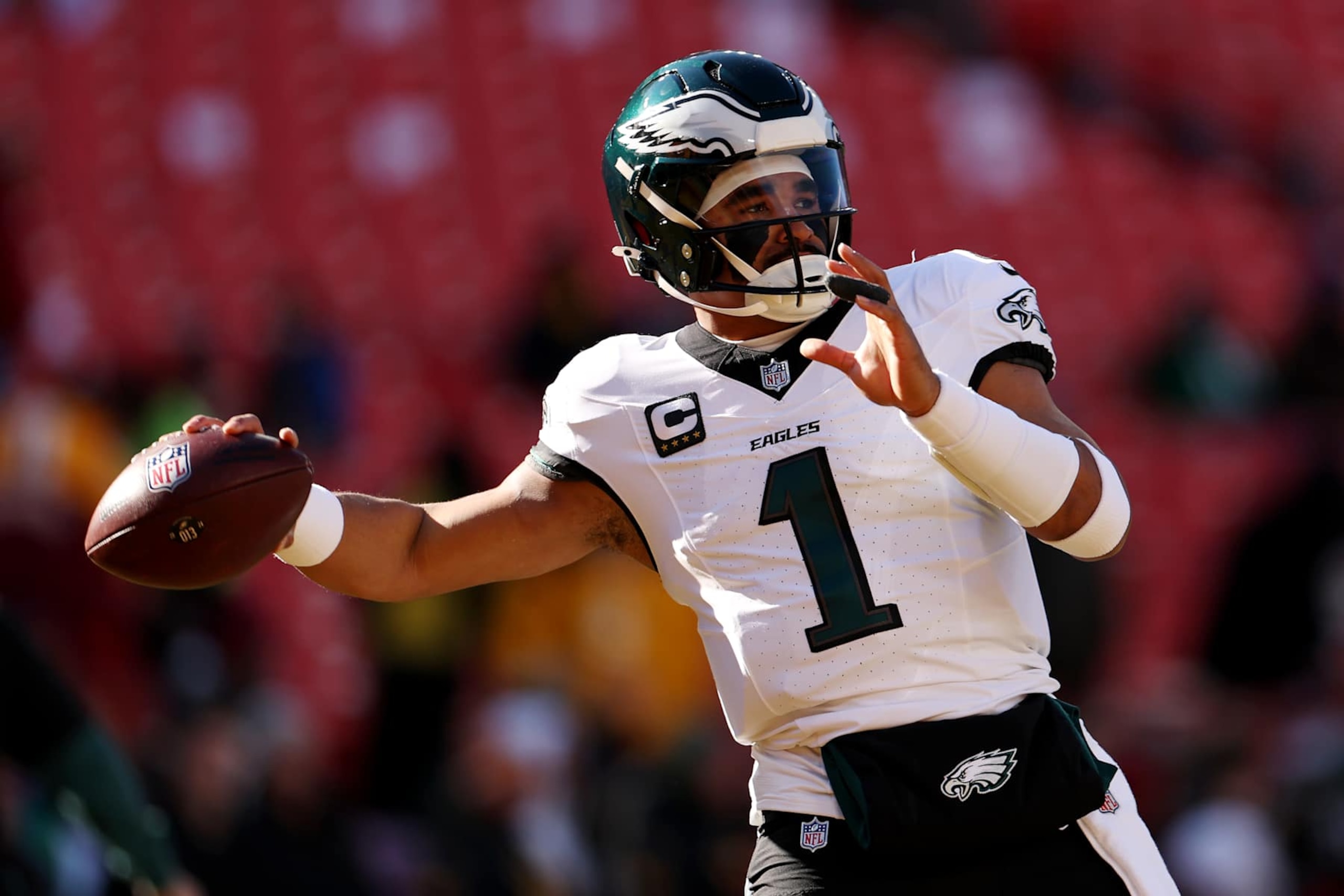 LANDOVER, MARYLAND - DECEMBER 22:  Jalen Hurts #1 of the Philadelphia Eagles warms up prior to the game against the Washington Commanders at Northwest Stadium on December 22, 2024 in Landover, Maryland. (Photo by Scott Taetsch/Getty Images)