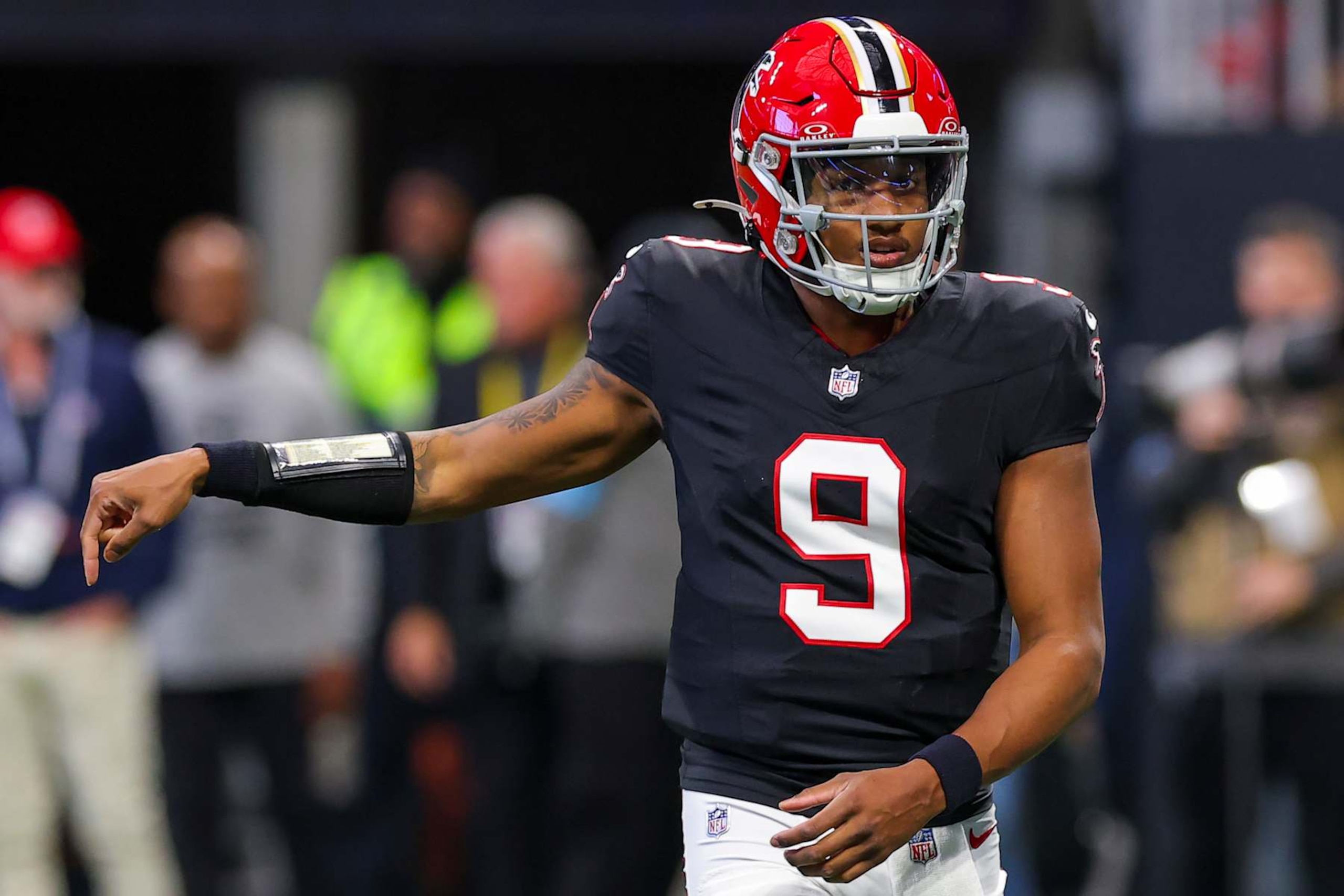 ATLANTA, GEORGIA - DECEMBER 22: Michael Penix Jr. #9 of the Atlanta Falcons runs onto the field during the first quarter against the New York Giants at Mercedes-Benz Stadium on December 22, 2024 in Atlanta, Georgia. (Photo by Kevin C. Cox/Getty Images)