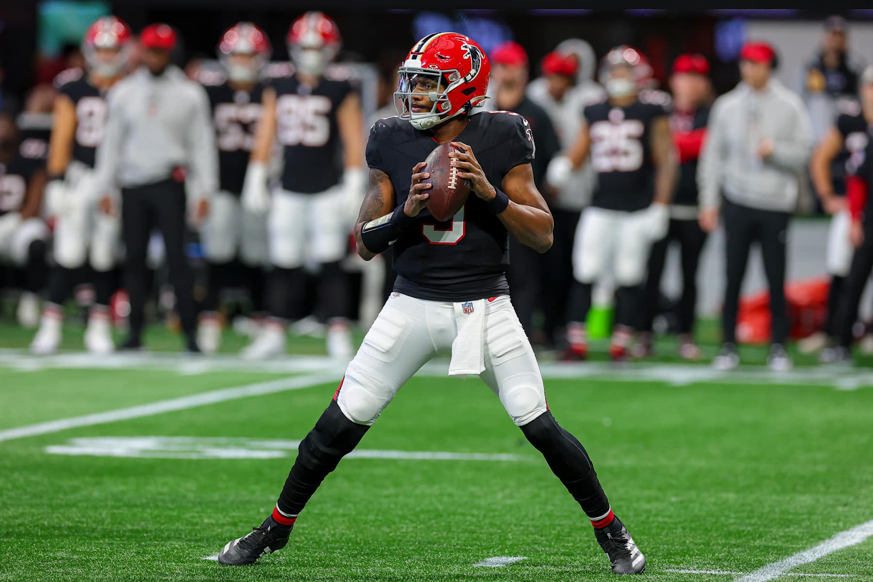 ATLANTA, GEORGIA - DECEMBER 22: Michael Penix Jr. #9 of the Atlanta Falcons looks to pass the ball against the New York Giants during the first quarter at Mercedes-Benz Stadium on December 22, 2024 in Atlanta, Georgia. (Photo by Kevin C. Cox/Getty Images)