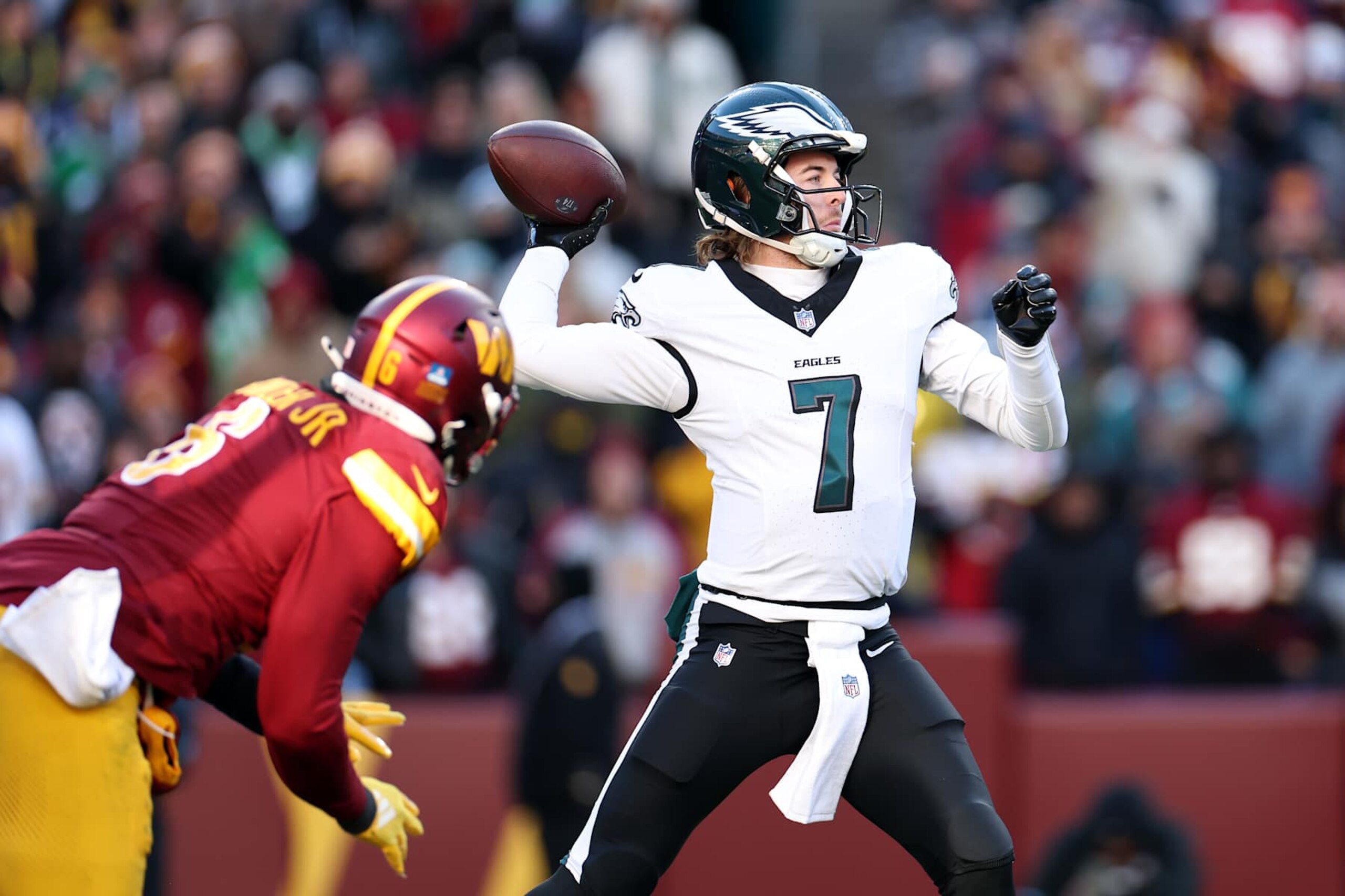 LANDOVER, MARYLAND - DECEMBER 22:  Kenny Pickett #7 of the Philadelphia Eagles attempts a pass against the Washington Commanders during the second quarter at Northwest Stadium on December 22, 2024 in Landover, Maryland. (Photo by Scott Taetsch/Getty Images)