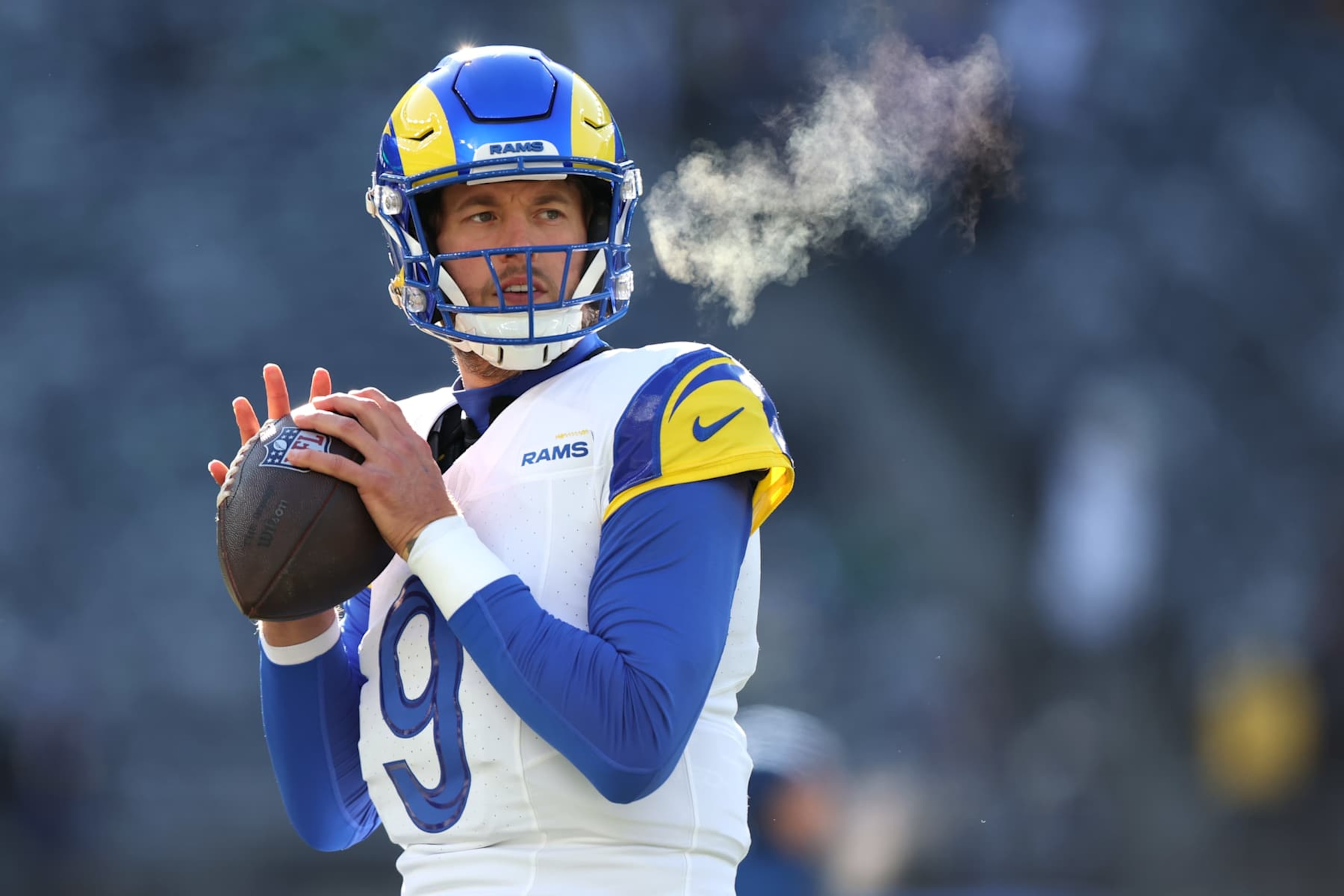 EAST RUTHERFORD, NEW JERSEY - DECEMBER 22: Matthew Stafford #9 of the Los Angeles Rams warms up before the game against the New York Jets at MetLife Stadium on December 22, 2024 in East Rutherford, New Jersey. (Photo by Emilee Chinn/Getty Images)