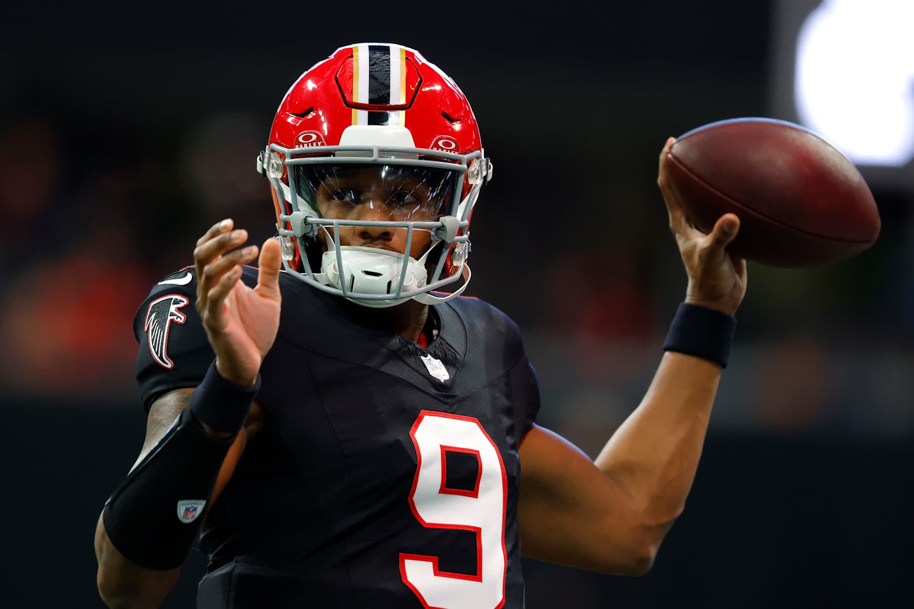 ATLANTA, GEORGIA - DECEMBER 22: Michael Penix Jr. #9 of the Atlanta Falcons warms up before the game against the New York Giants at Mercedes-Benz Stadium on December 22, 2024 in Atlanta, Georgia. (Photo by Todd Kirkland/Getty Images)