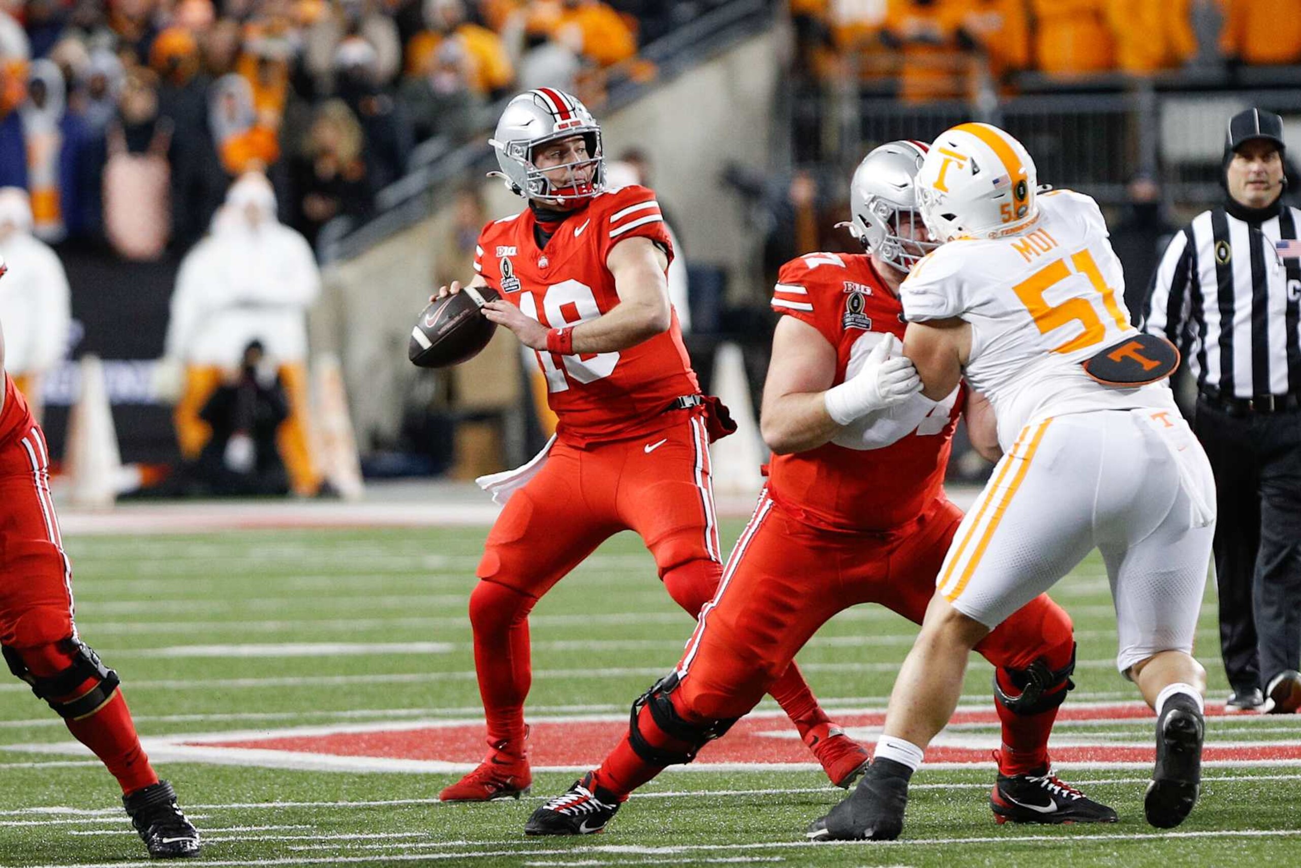 COLUMBUS, OH - DECEMBER 21: Ohio State Buckeyes quarterback Will Howard (18) passes the ball for a touchdown during the college football playoff first round game against the Tennessee Volunteers and the Ohio State Buckeyes on December 21, 2024, at Ohio Stadium in Columbus, OH. (Photo by Ian Johnson/Icon Sportswire via Getty Images) COLUMBUS, OH - DECEMBER 21: Ohio State Buckeyes quarterback Will Howard (18) passes the ball for a touchdown during the college football playoff first round game against the Tennessee Volunteers and the Ohio State Buckeyes on December 21, 2024, at Ohio Stadium in Columbus, OH. (Photo by Ian Johnson/Icon Sportswire via Getty Images)