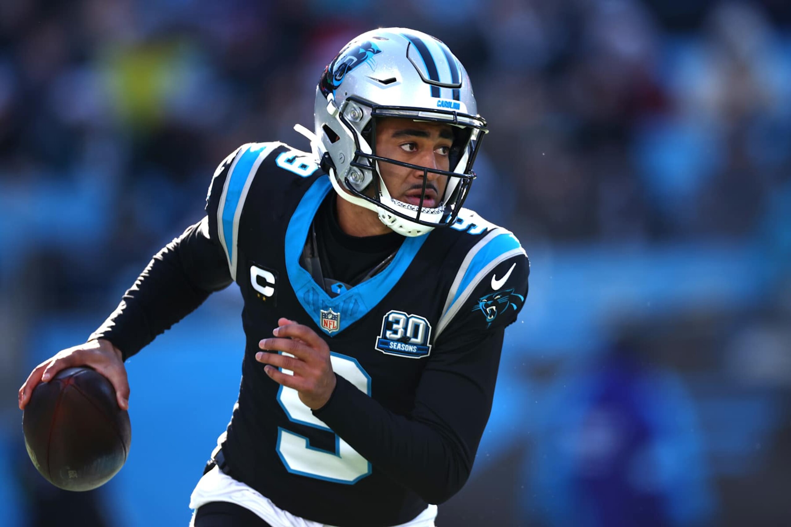 CHARLOTTE, NORTH CAROLINA - DECEMBER 22: Bryce Young #9 of the Carolina Panthers scrambles against the Arizona Cardinals during the second quarter at Bank of America Stadium on December 22, 2024 in Charlotte, North Carolina. (Photo by Jared C. Tilton/Getty Images) CHARLOTTE, NORTH CAROLINA - DECEMBER 22: Bryce Young #9 of the Carolina Panthers scrambles against the Arizona Cardinals during the second quarter at Bank of America Stadium on December 22, 2024 in Charlotte, North Carolina. (Photo by Jared C. Tilton/Getty Images)