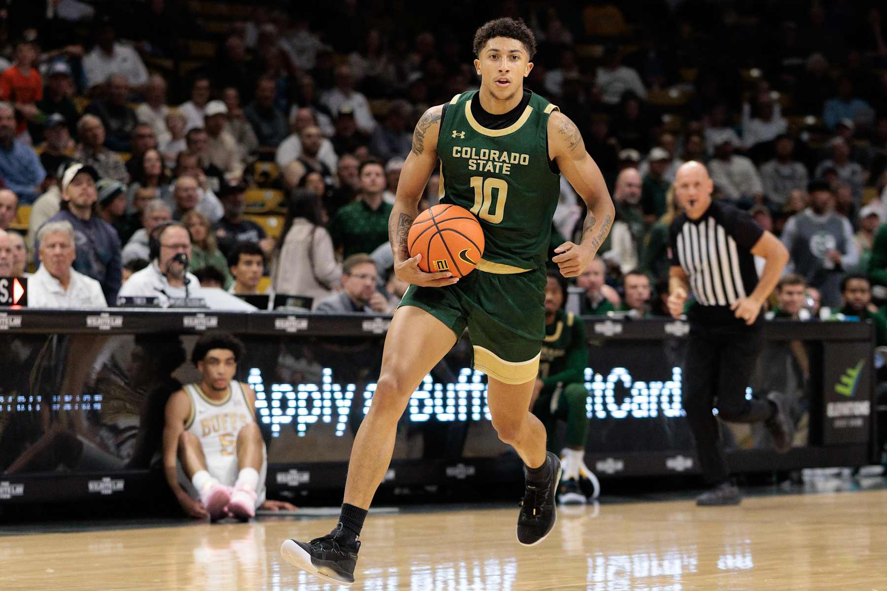 BOULDER, COLORADO - DECEMBER 07: Nique Clifford #10 of the Colorado State Rams drives to the basket against the Colorado Buffaloes during the first half at the CU Events Center on December 07, 2024 in Boulder, Colorado. (Photo by Andrew Wevers/Getty Images)