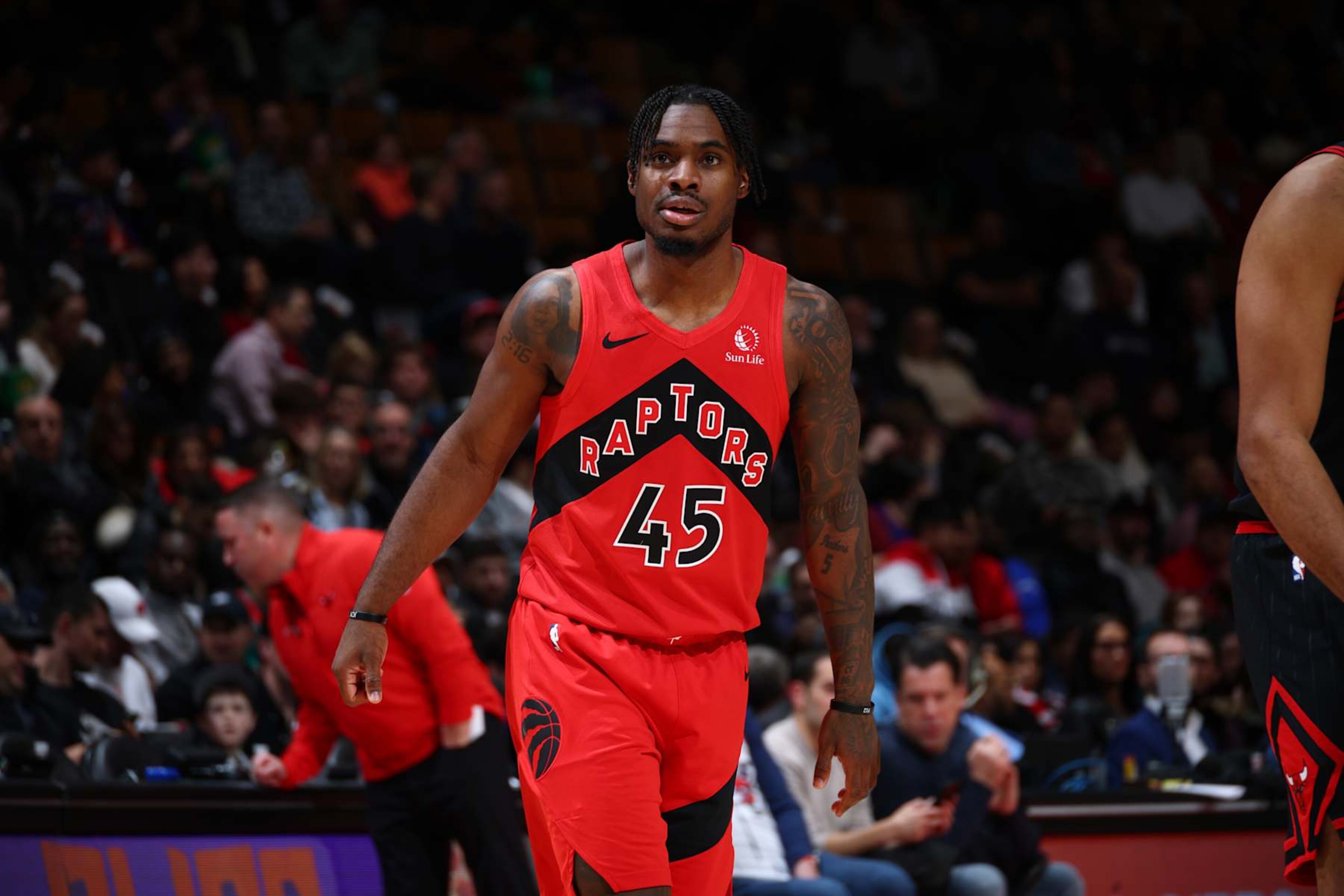 TORONTO, CANADA - DECEMBER 16: Davion Mitchell #45 of the Toronto Raptors looks on during the game against the Chicago Bulls on December 16, 2024 at the Scotiabank Arena in Toronto, Ontario, Canada. NOTE TO USER: User expressly acknowledges and agrees that, by downloading and or using this Photograph, user is consenting to the terms and conditions of the Getty Images License Agreement. Mandatory Copyright Notice: Copyright 2024 NBAE (Photo by Vaughn Ridley/NBAE via Getty Images) TORONTO, CANADA - DECEMBER 16: Davion Mitchell #45 of the Toronto Raptors looks on during the game against the Chicago Bulls on December 16, 2024 at the Scotiabank Arena in Toronto, Ontario, Canada. NOTE TO USER: User expressly acknowledges and agrees that, by downloading and or using this Photograph, user is consenting to the terms and conditions of the Getty Images License Agreement. Mandatory Copyright Notice: Copyright 2024 NBAE (Photo by Vaughn Ridley/NBAE via Getty Images)