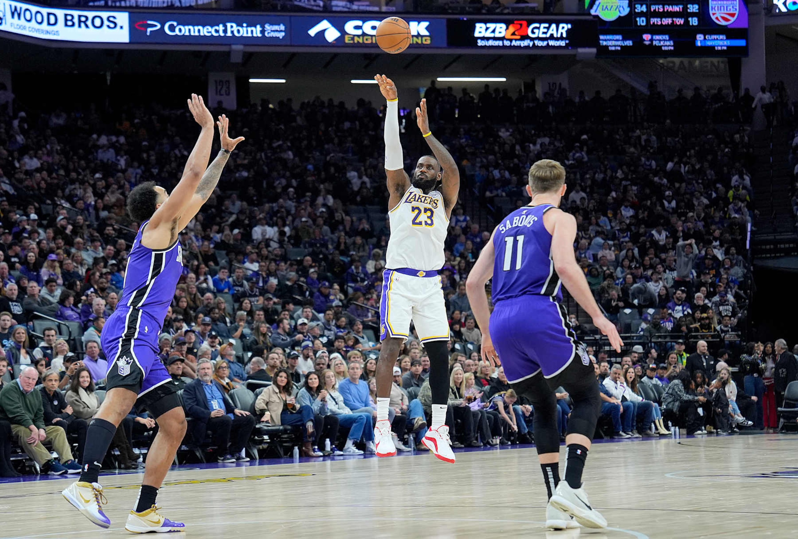 SACRAMENTO, CALIFORNIA - DECEMBER 21: LeBron James #23 of the Los Angeles Lakers shoots a three-point shot against the Sacramento Kings during the second half at Golden 1 Center on December 21, 2024 in Sacramento, California. NOTE TO USER: User expressly acknowledges and agrees that, by downloading and or using this photograph, User is consenting to the terms and conditions of the Getty Images License Agreement. (Photo by Thearon W. Henderson/Getty Images) SACRAMENTO, CALIFORNIA - DECEMBER 21: LeBron James #23 of the Los Angeles Lakers shoots a three-point shot against the Sacramento Kings during the second half at Golden 1 Center on December 21, 2024 in Sacramento, California. NOTE TO USER: User expressly acknowledges and agrees that, by downloading and or using this photograph, User is consenting to the terms and conditions of the Getty Images License Agreement. (Photo by Thearon W. Henderson/Getty Images)