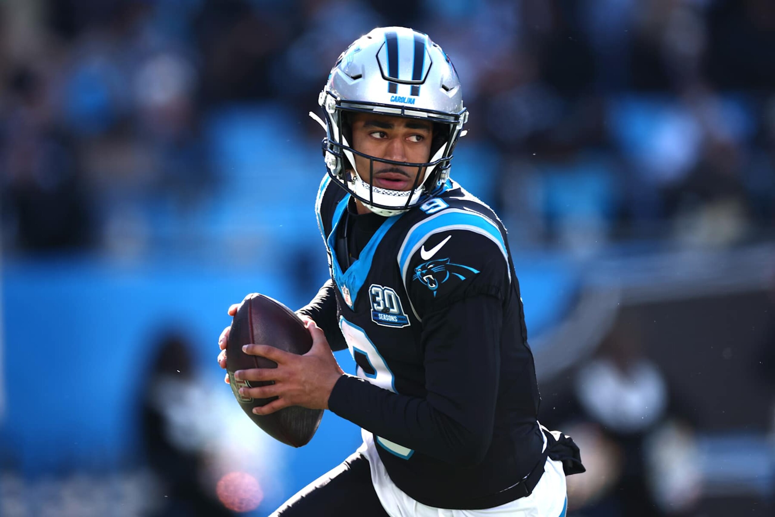 CHARLOTTE, NORTH CAROLINA - DECEMBER 22: Bryce Young #9 of the Carolina Panthers drops to pass against the Arizona Cardinals during the second quarter at Bank of America Stadium on December 22, 2024 in Charlotte, North Carolina. (Photo by Jared C. Tilton/Getty Images)