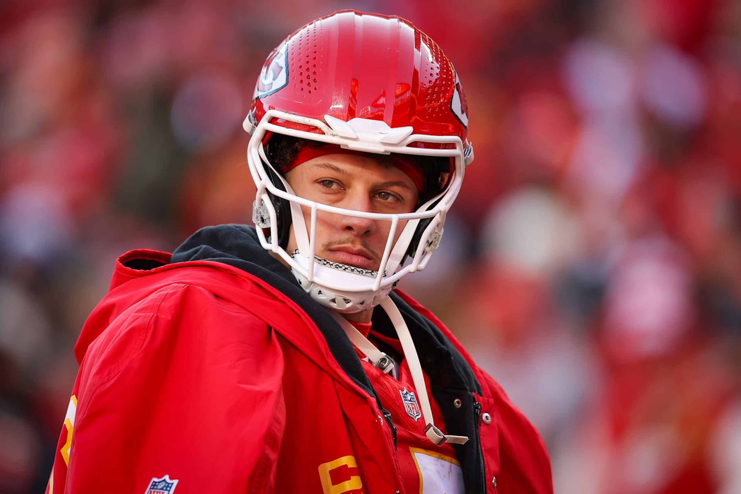 KANSAS CITY, MISSOURI - DECEMBER 21: Patrick Mahomes #15 of the Kansas City Chiefs waits on the field during an injury timeout in the third quarter against the Houston Texans at GEHA Field at Arrowhead Stadium on December 21, 2024 in Kansas City, Missouri. (Photo by David Eulitt/Getty Images)