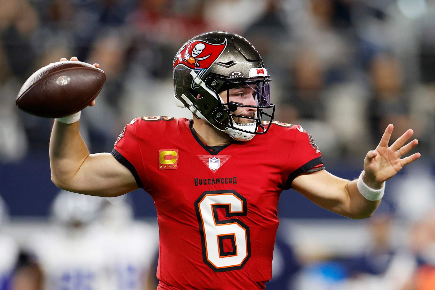 ARLINGTON, TEXAS - DECEMBER 22: Quarterback Baker Mayfield #6 of the Tampa Bay Buccaneers throws a pass during the first quarter against the Dallas Cowboys at AT&T Stadium on December 22, 2024 in Arlington, Texas. (Photo by Ron Jenkins/Getty Images)