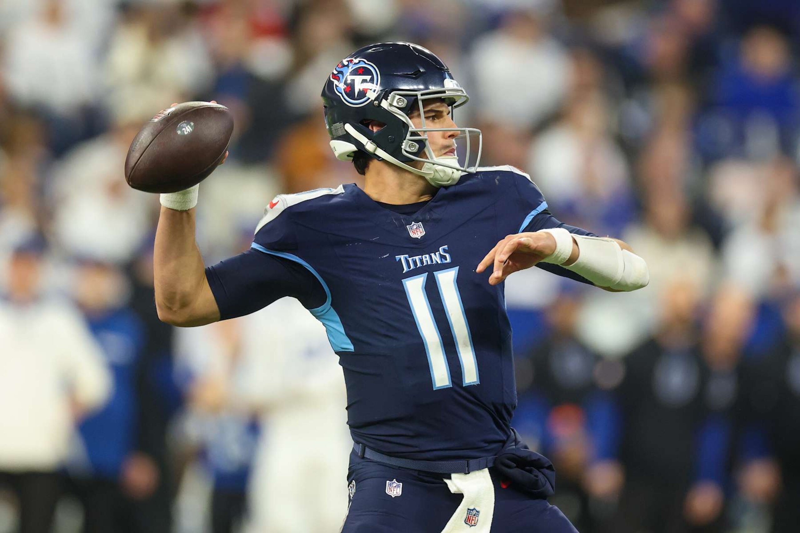 INDIANAPOLIS, INDIANA - DECEMBER 22: Mason Rudolph #11 of the Tennessee Titans throws a pass against the Indianapolis Colts in the third quarter at Lucas Oil Stadium on December 22, 2024 in Indianapolis, Indiana. (Photo by Andy Lyons/Getty Images)