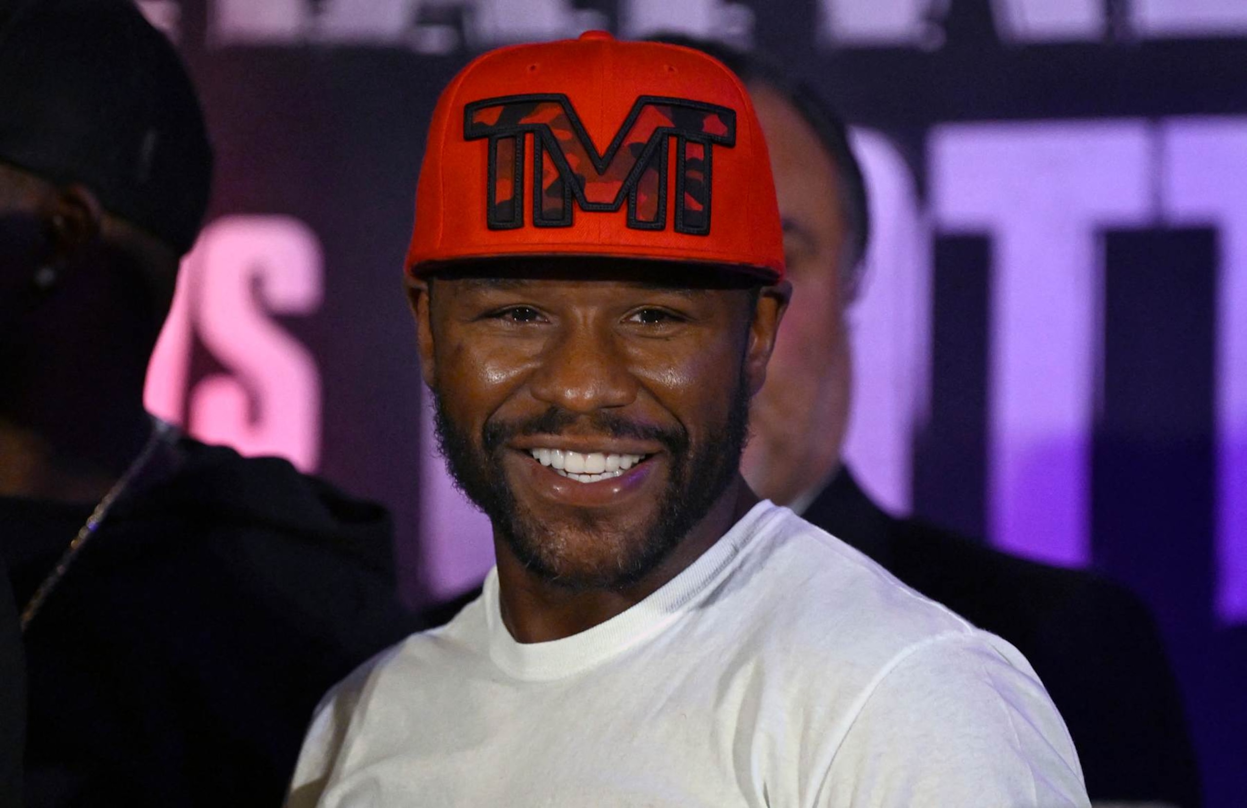 US boxer Floyd Mayweather Jr. smiles during the weighing ceremony for his upcoming exhibition fight against John Gutti III in Mexico City on August 23, 2024. Mayweather Jr. and Gotti III will face each other in an exhibition fight in Mexico on August 24, 2024. (Photo by ALFREDO ESTRELLA / AFP) (Photo by ALFREDO ESTRELLA/AFP via Getty Images)