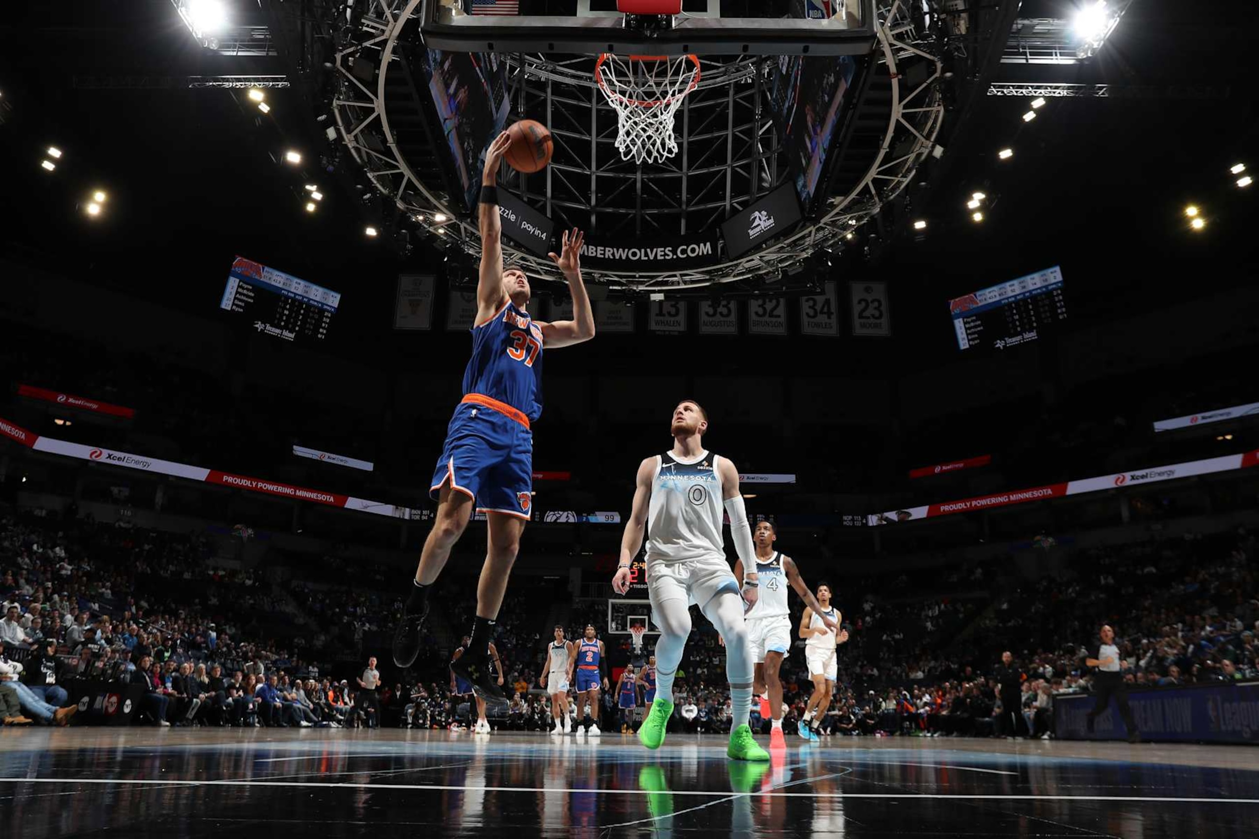 MINNEAPOLIS, MN -  DECEMBER 19:  Matt Ryan #37 of the New York Knicks shoots the ball during the game against the Minnesota Timberwolves on December 19, 2024 at Target Center in Minneapolis, Minnesota. NOTE TO USER: User expressly acknowledges and agrees that, by downloading and or using this Photograph, user is consenting to the terms and conditions of the Getty Images License Agreement. Mandatory Copyright Notice: Copyright 2024 NBAE (Photo by Jordan Johnson/NBAE via Getty Images)