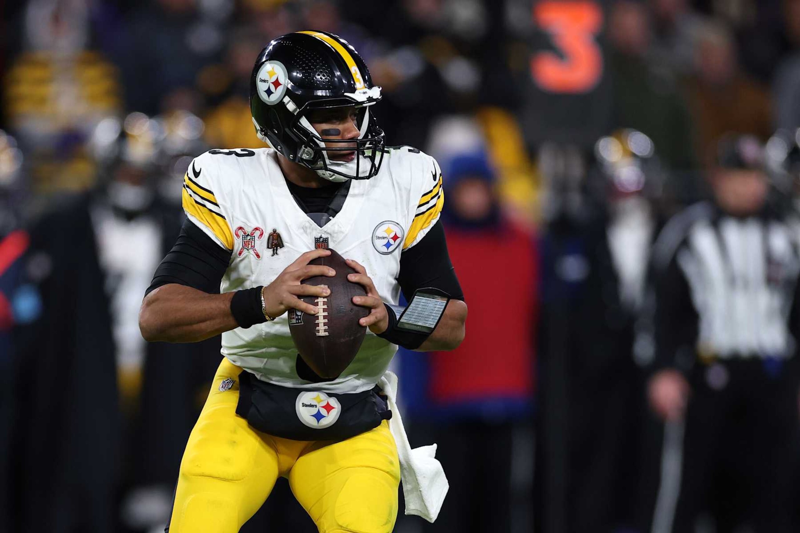 BALTIMORE, MARYLAND - DECEMBER 21: Russell Wilson #3 of the Pittsburgh Steelers looks to pass during the second quarter against the Baltimore Ravens at M&T Bank Stadium on December 21, 2024 in Baltimore, Maryland. (Photo by Patrick Smith/Getty Images)