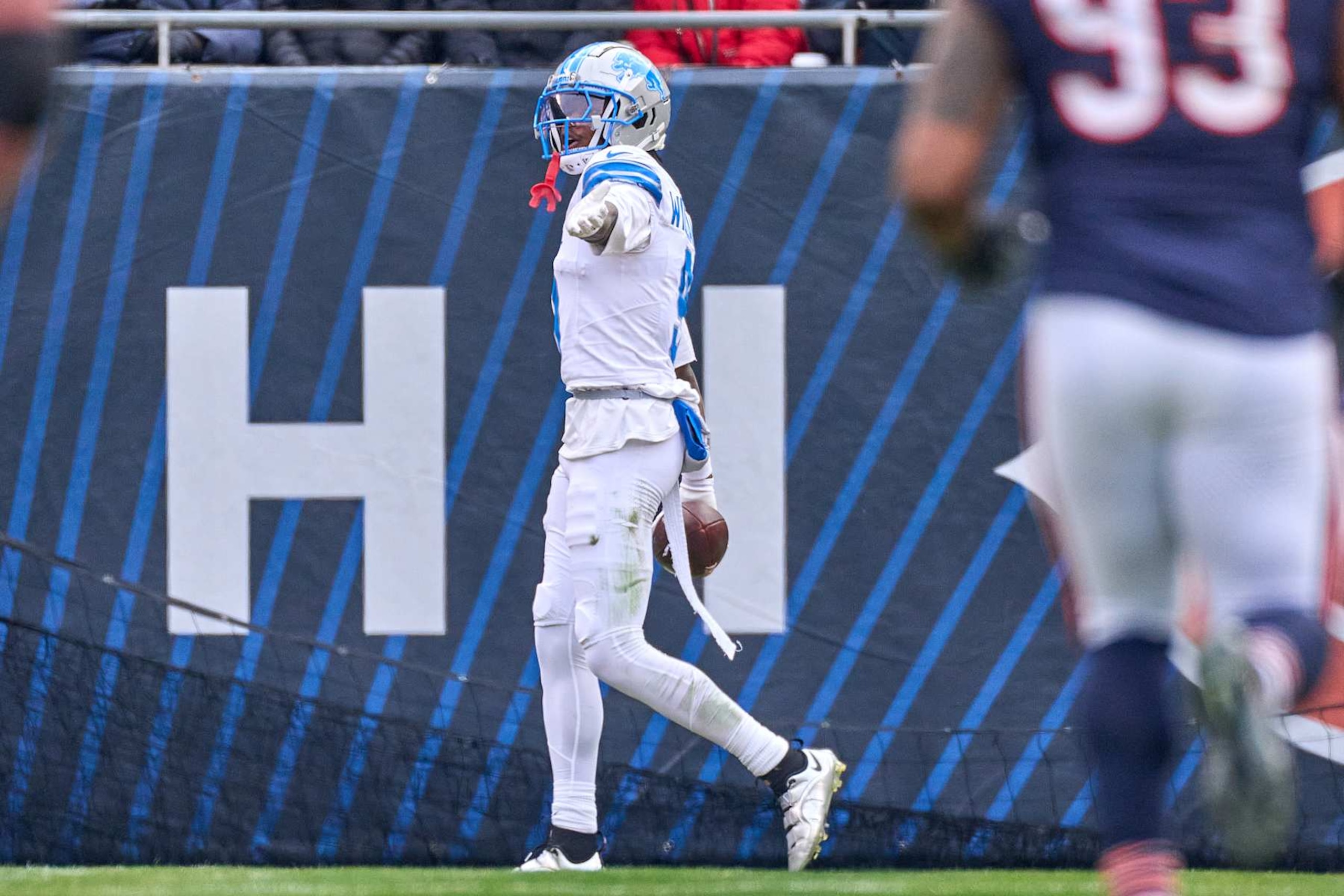 CHICAGO, IL - DECEMBER 22: Detroit Lions wide receiver Jameson Williams (9) celebrates with teammates after scoring a touchdown in action during a game between the Detroit Lions and the Chicago Bears on December 22, 2024 at Soldier Field in Chicago, IL. (Photo by Robin Alam/Icon Sportswire via Getty Images)
