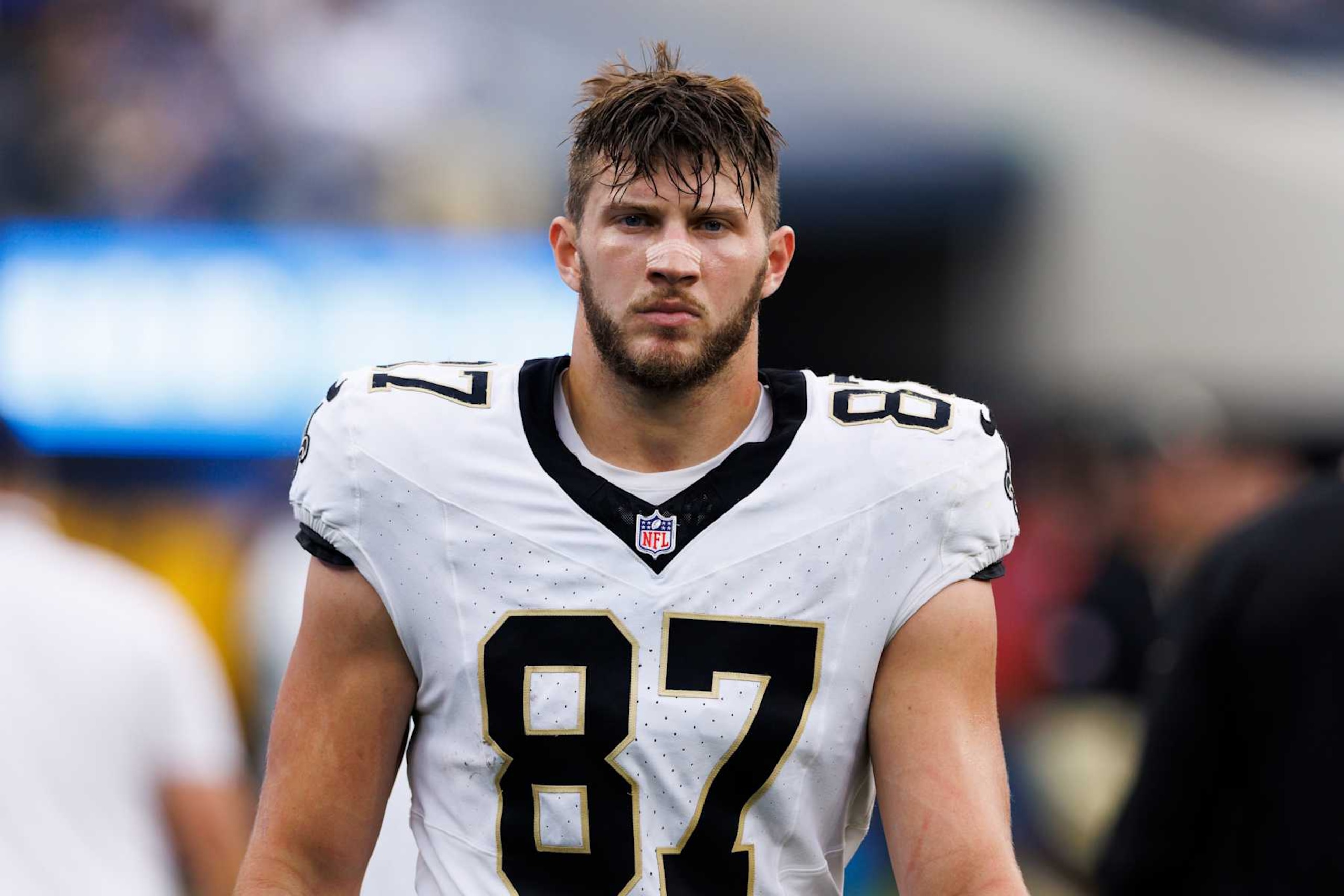 INGLEWOOD, CALIFORNIA - OCTOBER 27: Foster Moreau #87 of the New Orleans Saints on the sideline during the second half against the Los Angeles Chargers at SoFi Stadium on October 27, 2024 in Inglewood, California. (Photo by Ric Tapia/Getty Images) INGLEWOOD, CALIFORNIA - OCTOBER 27: Foster Moreau #87 of the New Orleans Saints on the sideline during the second half against the Los Angeles Chargers at SoFi Stadium on October 27, 2024 in Inglewood, California. (Photo by Ric Tapia/Getty Images)