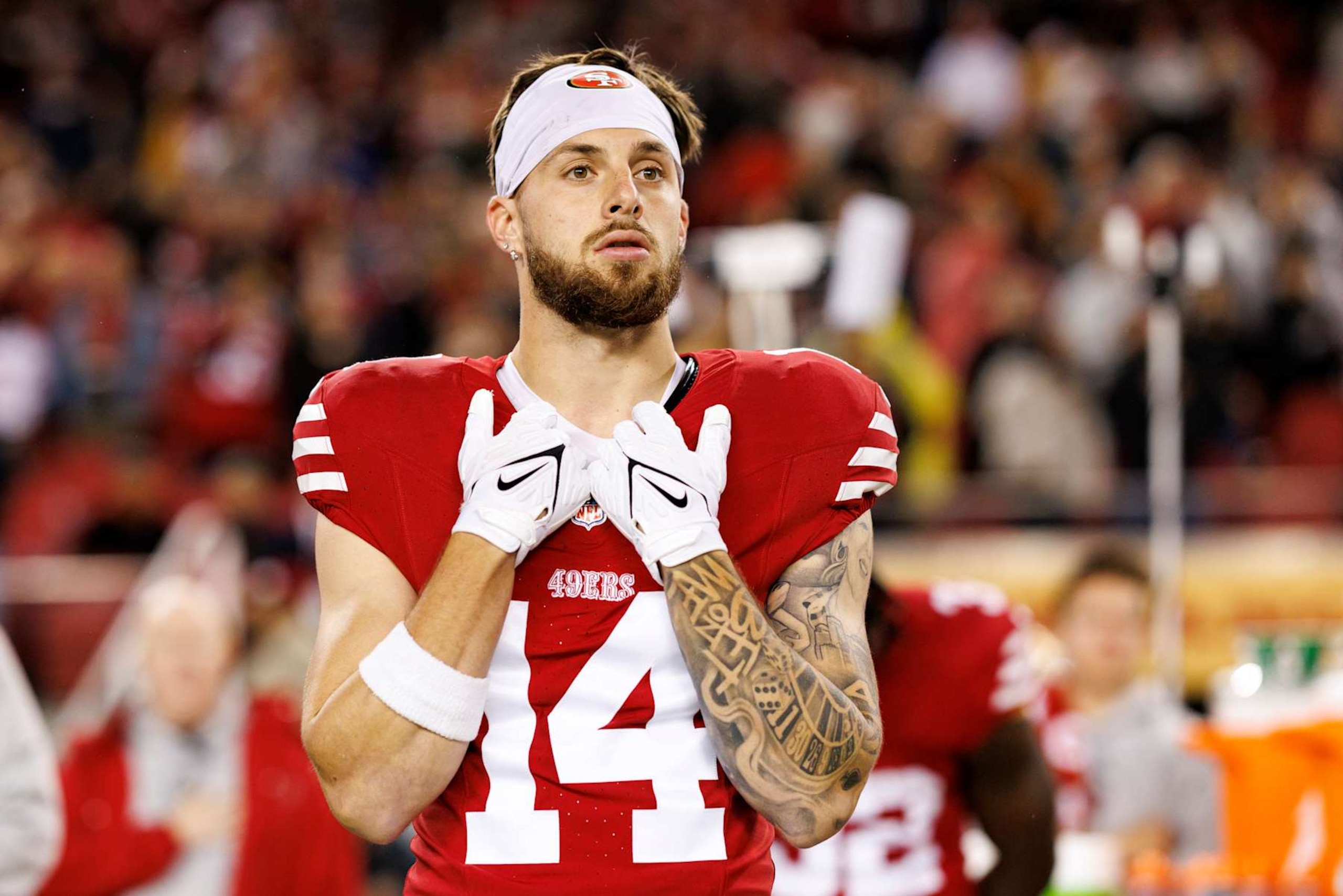 SANTA CLARA, CALIFORNIA - DECEMBER 12: Wide receiver Ricky Pearsall #14 of the San Francisco 49ers stands on the sidelines during the national anthem prior to an NFL football game against the Los Angeles Rams, at Levi's Stadium on December 12, 2024 in Santa Clara, California. (Photo by Brooke Sutton/Getty Images) SANTA CLARA, CALIFORNIA - DECEMBER 12: Wide receiver Ricky Pearsall #14 of the San Francisco 49ers stands on the sidelines during the national anthem prior to an NFL football game against the Los Angeles Rams, at Levi's Stadium on December 12, 2024 in Santa Clara, California. (Photo by Brooke Sutton/Getty Images)