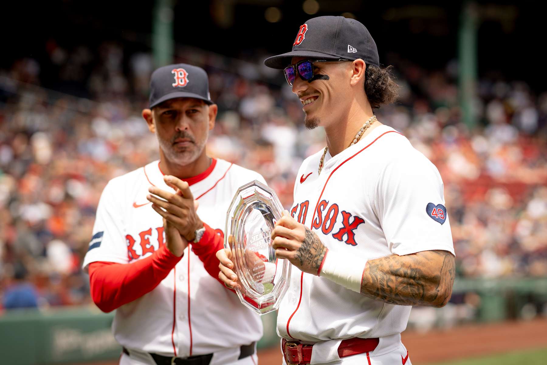 Alex Cora (L) and Jarren Duran (R)