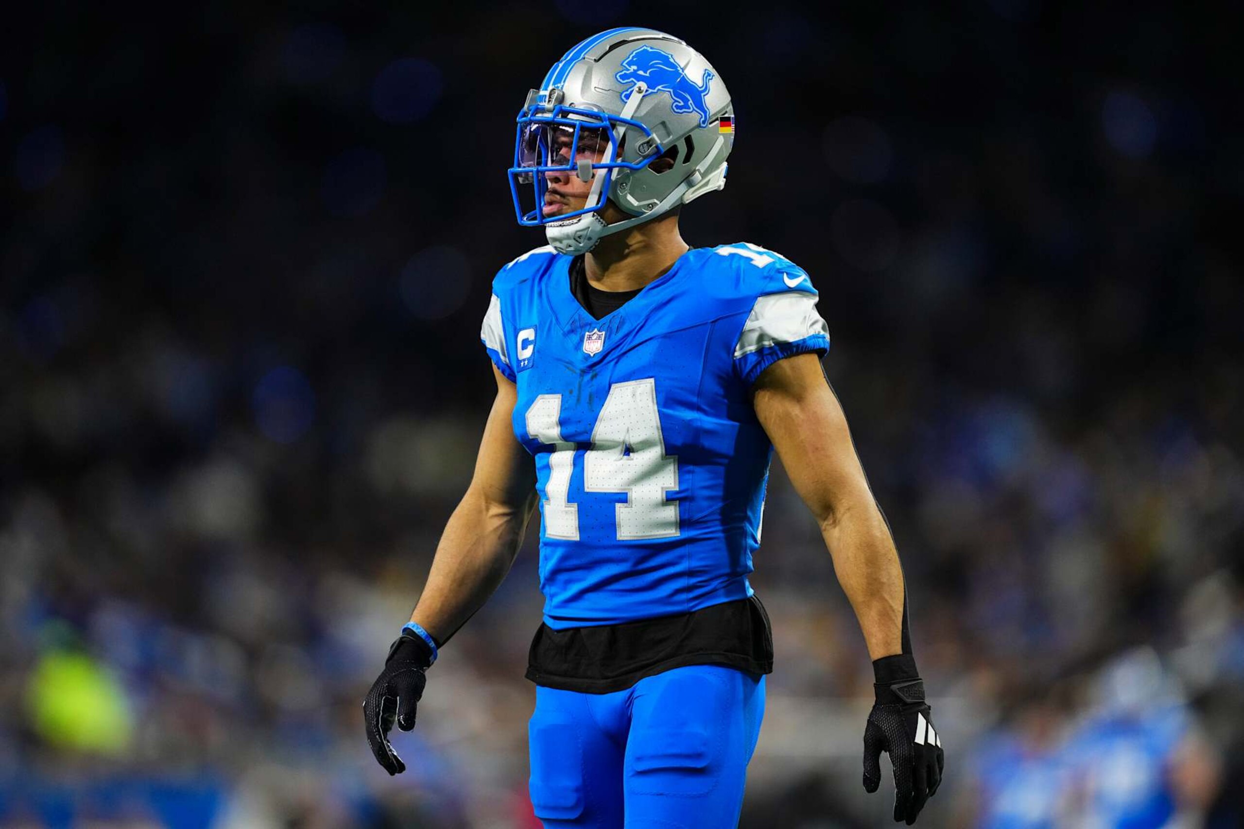 DETROIT, MI - DECEMBER 05: Amon-Ra St. Brown #14 of the Detroit Lions looks on from the field during an NFL football game against the Green Bay Packers at Ford Field on December 5, 2024 in Detroit, Michigan. (Photo by Cooper Neill/Getty Images)