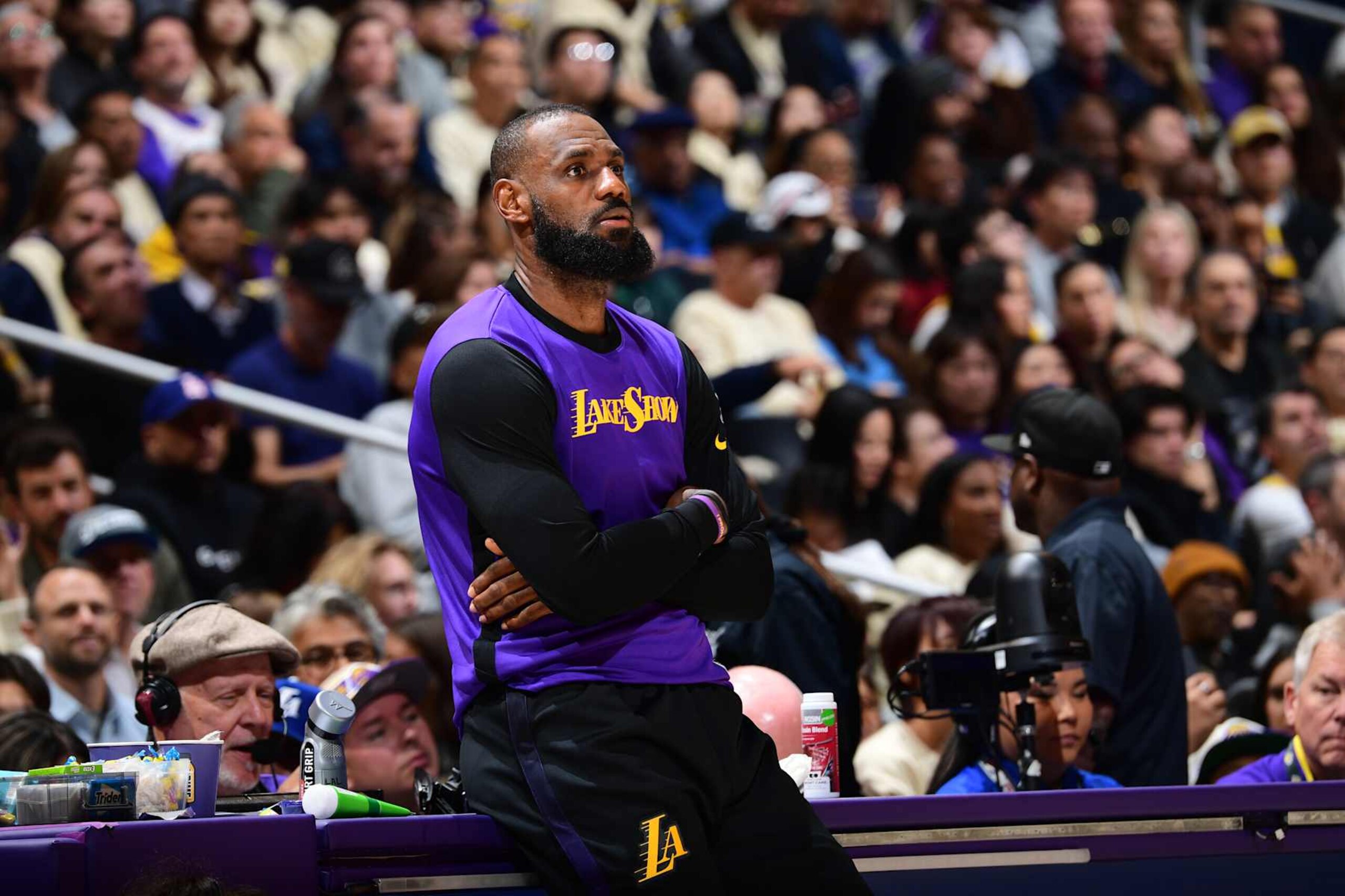 LOS ANGELES, CA - DECEMBER 23:  LeBron James #23 of the Los Angeles Lakers looks on during the game against the Detroit Pistons on December 23, 2024 at Crypto.Com Arena in Los Angeles, California. NOTE TO USER: User expressly acknowledges and agrees that, by downloading and/or using this Photograph, user is consenting to the terms and conditions of the Getty Images License Agreement. Mandatory Copyright Notice: Copyright 2024 NBAE (Photo by Adam Pantozzi/NBAE via Getty Images)