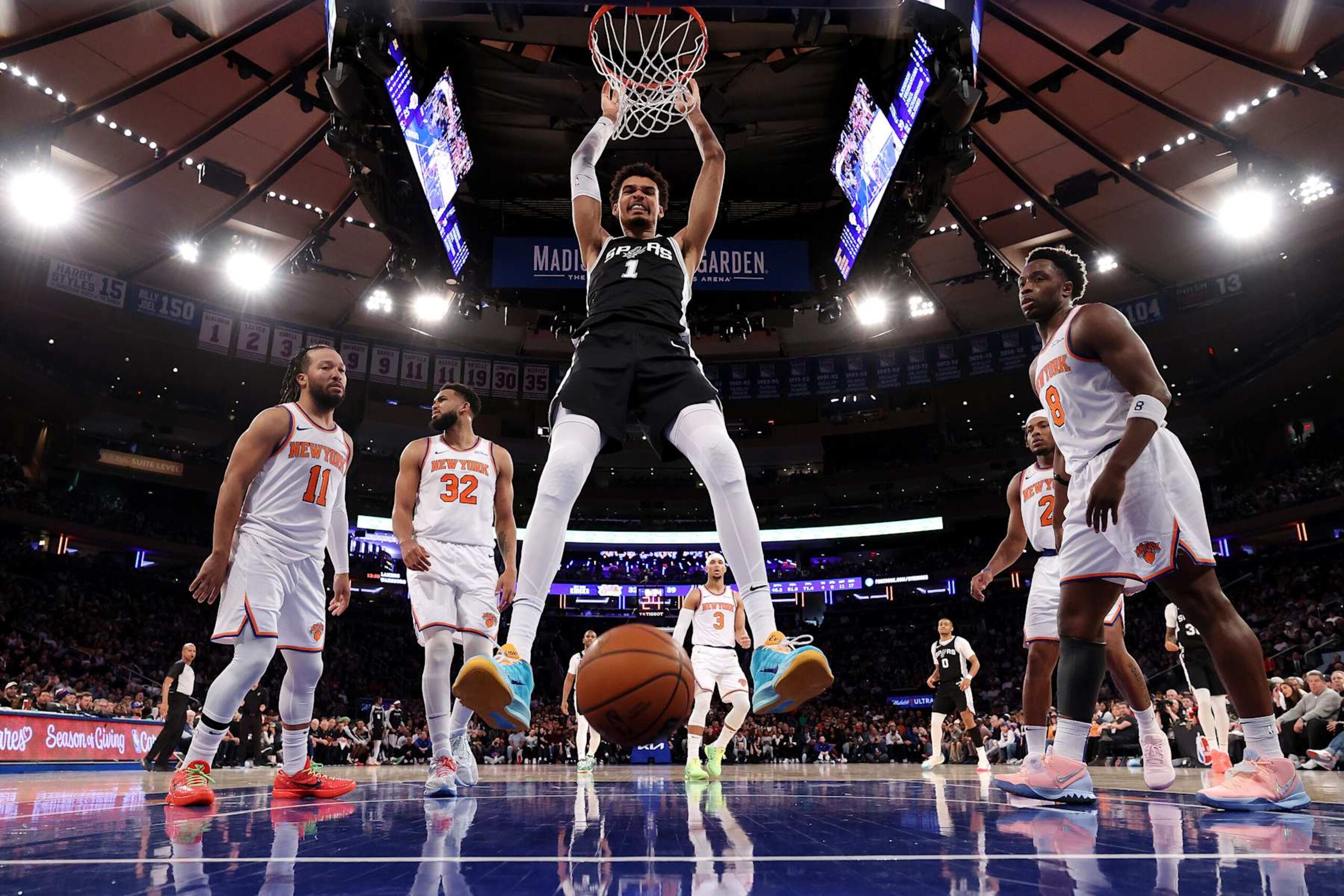 NEW YORK, NEW YORK - DECEMBER 25: Victor Wembanyama #1 of the San Antonio Spurs dunks the ball against the New York Knicks during the second quarter at Madison Square Garden on December 25, 2024 in New York City. NOTE TO USER: User expressly acknowledges and agrees that, by downloading and or using this photograph, User is consenting to the terms and conditions of the Getty Images License Agreement. (Photo by Luke Hales/Getty Images) NEW YORK, NEW YORK - DECEMBER 25: Victor Wembanyama #1 of the San Antonio Spurs dunks the ball against the New York Knicks during the second quarter at Madison Square Garden on December 25, 2024 in New York City. NOTE TO USER: User expressly acknowledges and agrees that, by downloading and or using this photograph, User is consenting to the terms and conditions of the Getty Images License Agreement. (Photo by Luke Hales/Getty Images)