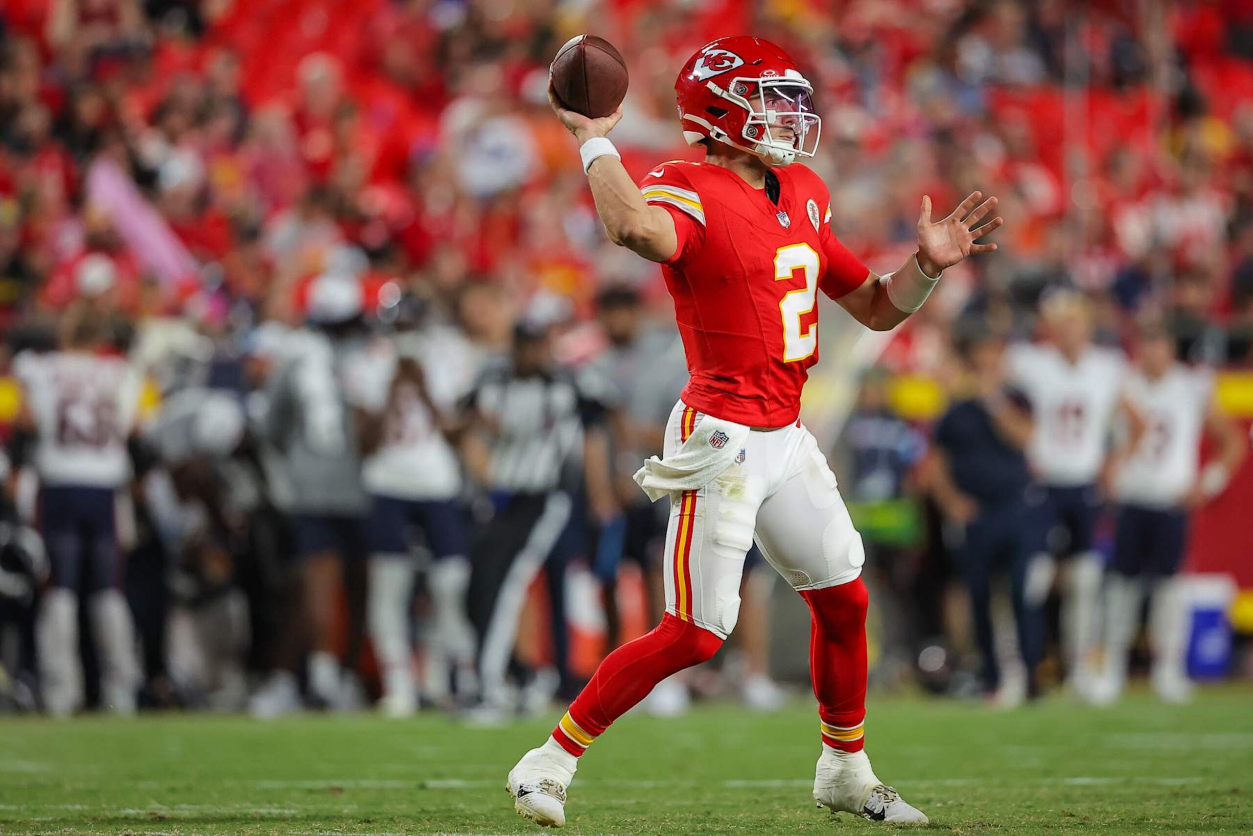 KANSAS CITY, MISSOURI - AUGUST 22: Ian Book #2 of the Kansas City Chiefs throws a pass during fourth quarter preseason game action against the Chicago Bears at GEHA Field at Arrowhead Stadium on August 22, 2024 in Kansas City, Missouri.  (Photo by David Eulitt/Getty Images)