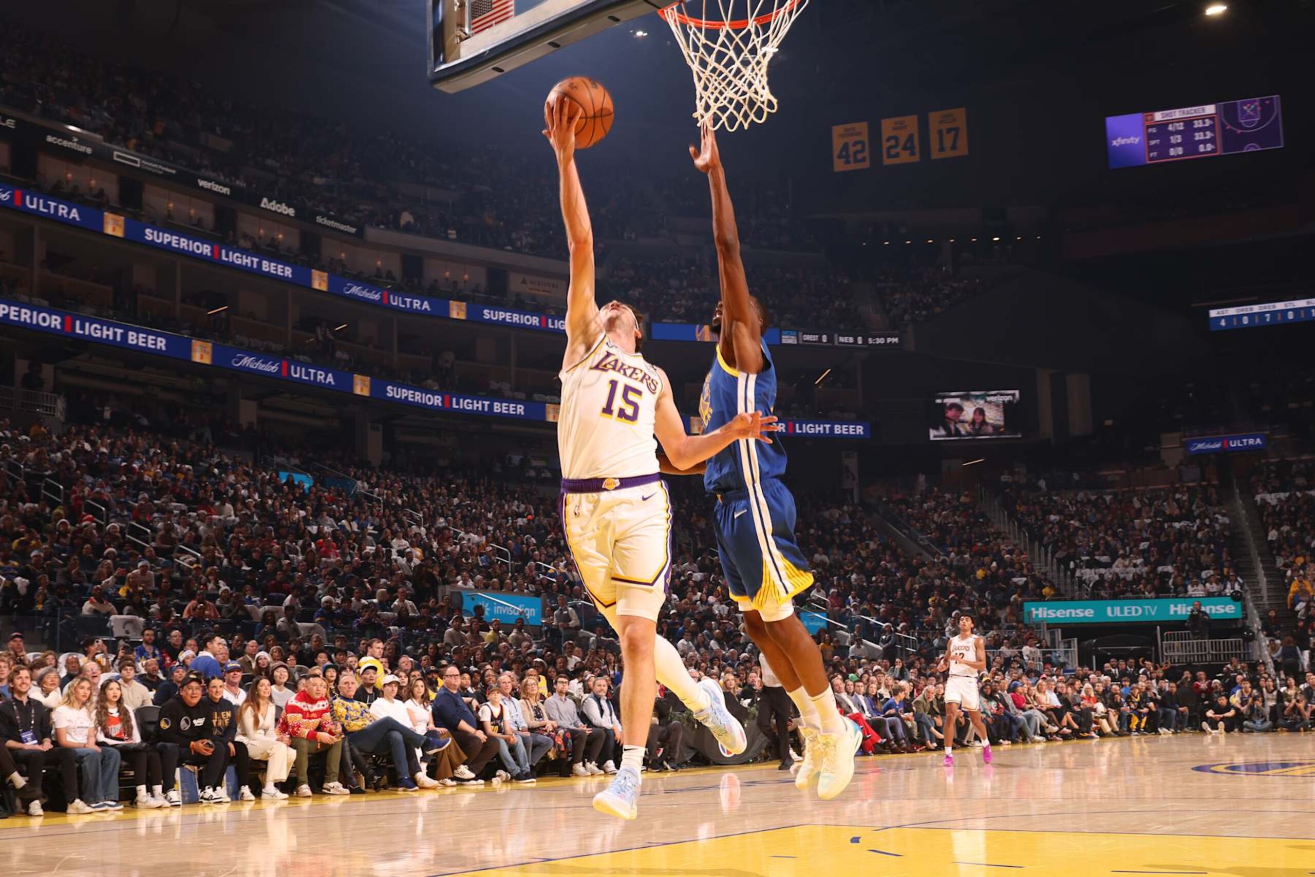SAN FRANCISCO, CA - DECEMBER 25: Austin Reaves #15 of the Los Angeles Lakers drives to the basket during the game against the Golden State Warriors on December 25, 2024 at Chase Center in San Francisco, California. NOTE TO USER: User expressly acknowledges and agrees that, by downloading and or using this photograph, user is consenting to the terms and conditions of Getty Images License Agreement. Mandatory Copyright Notice: Copyright 2024 NBAE (Photo by Jed Jacobsohn/NBAE via Getty Images)