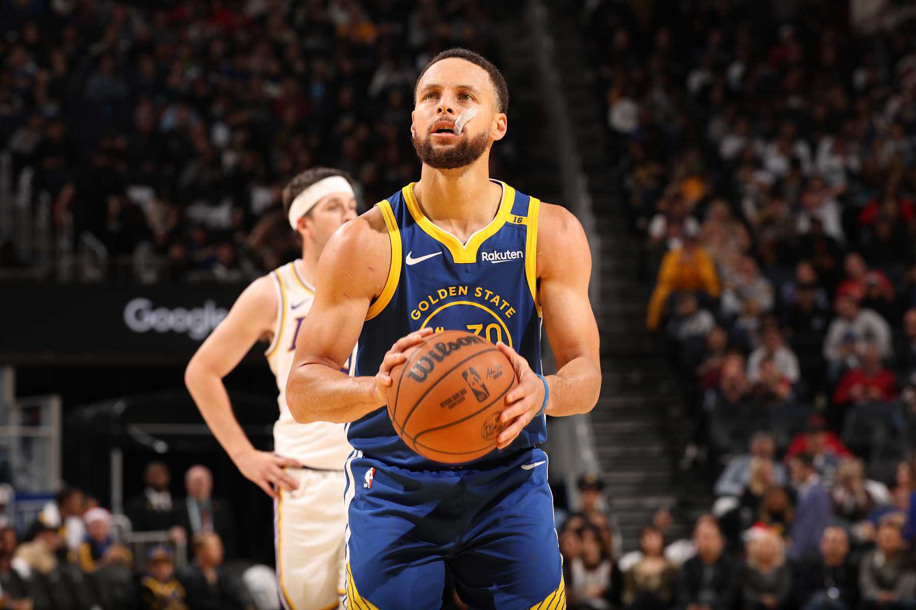 SAN FRANCISCO, CA - DECEMBER 25: Stephen Curry #30 of the Golden State Warriors shoots a free throw during the game against the Los Angeles Lakers on December 25, 2024 at Chase Center in San Francisco, California. NOTE TO USER: User expressly acknowledges and agrees that, by downloading and or using this photograph, user is consenting to the terms and conditions of Getty Images License Agreement. Mandatory Copyright Notice: Copyright 2024 NBAE (Photo by Jed Jacobsohn/NBAE via Getty Images)