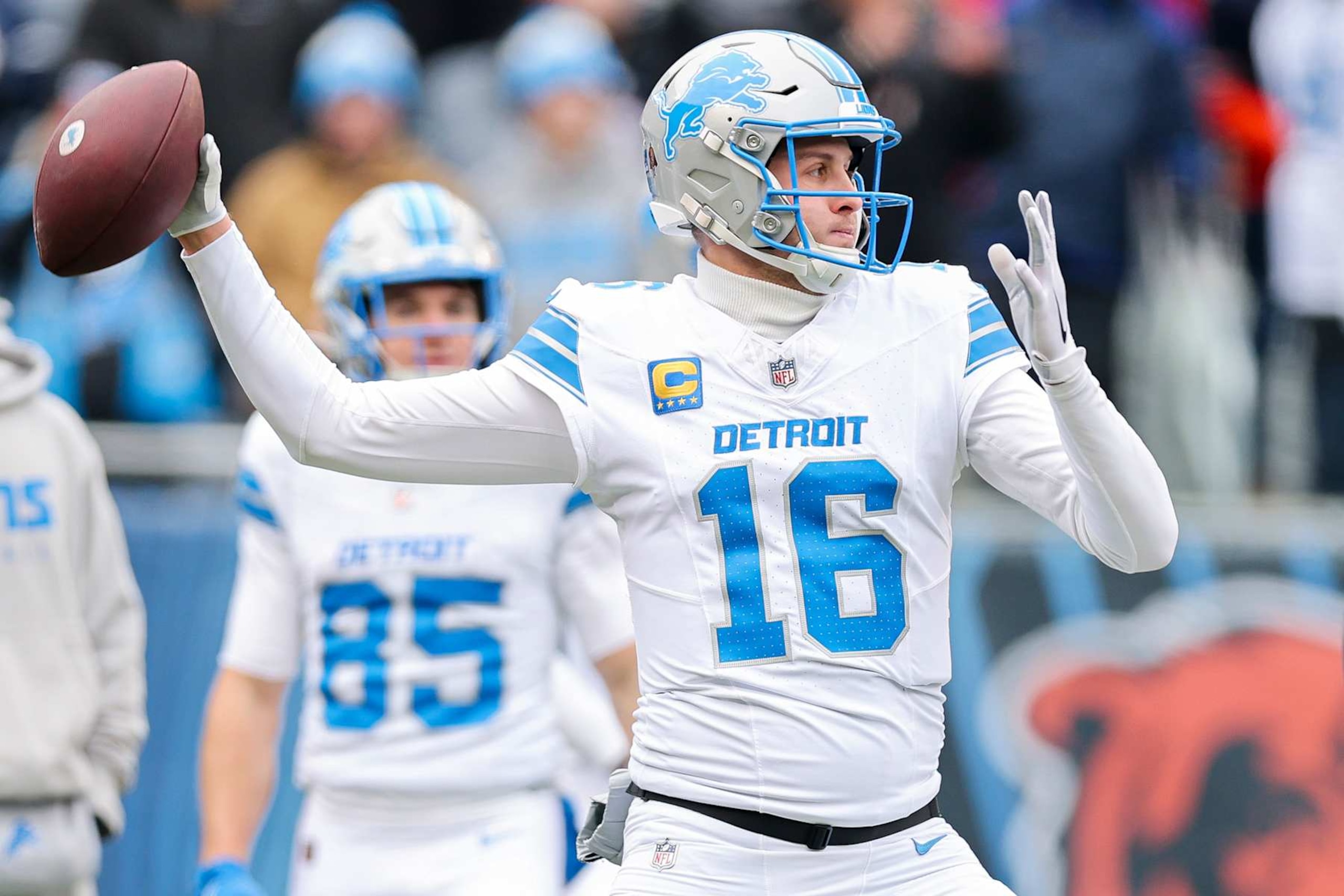 CHICAGO, ILLINOIS - DECEMBER 22: Jared Goff #16 of the Detroit Lions warms up before the game against the Chicago Bears at Soldier Field on December 22, 2024 in Chicago, Illinois. (Photo by Michael Reaves/Getty Images)