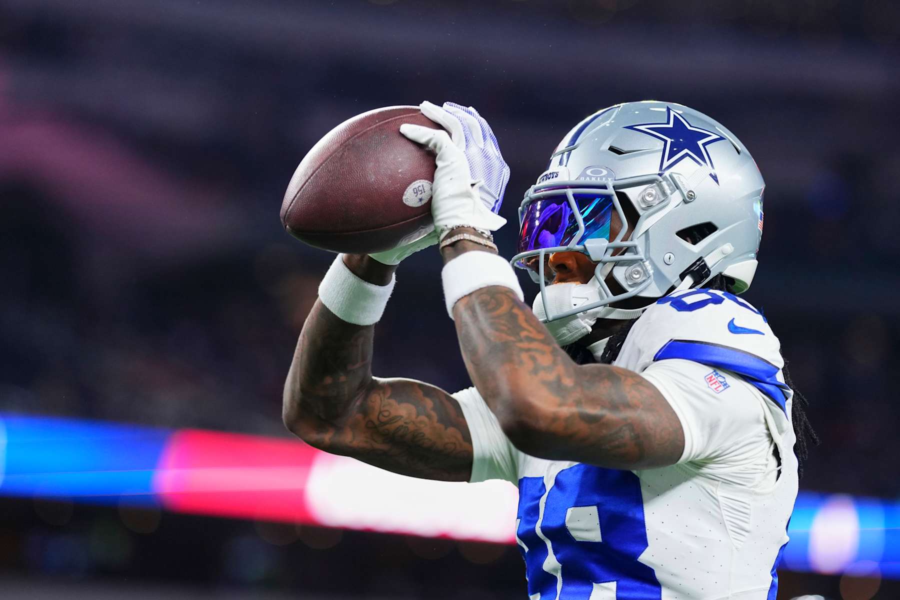 ARLINGTON, TX - DECEMBER 22: CeeDee Lamb #88 of the Dallas Cowboys warms up before kickoff against the Tampa Bay Buccaneers during an NFL football game at AT&T Stadium on December 22, 2024 in Arlington, Texas. (Photo by Cooper Neill/Getty Images)