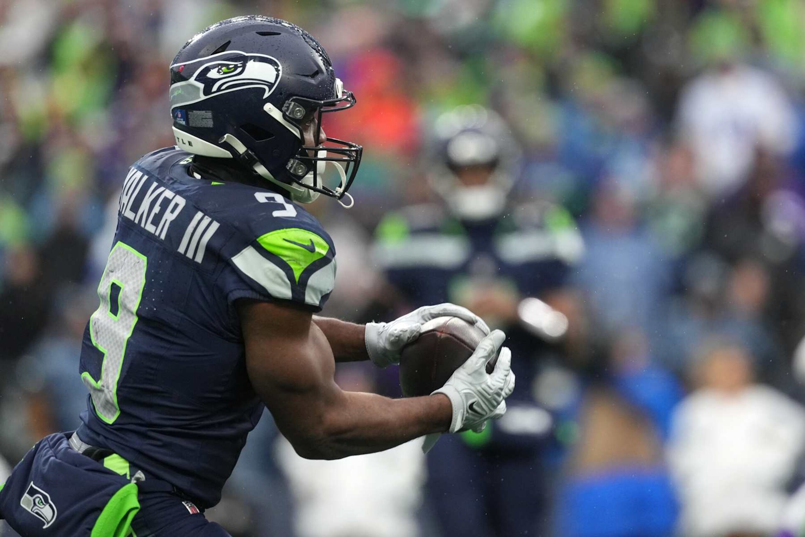 SEATTLE, WASHINGTON - DECEMBER 22: Kenneth Walker III #9 of the Seattle Seahawks catches a pass against the Minnesota Vikings during the second quarter at Lumen Field on December 22, 2024 in Seattle, Washington. (Photo by Christopher Mast/Getty Images)