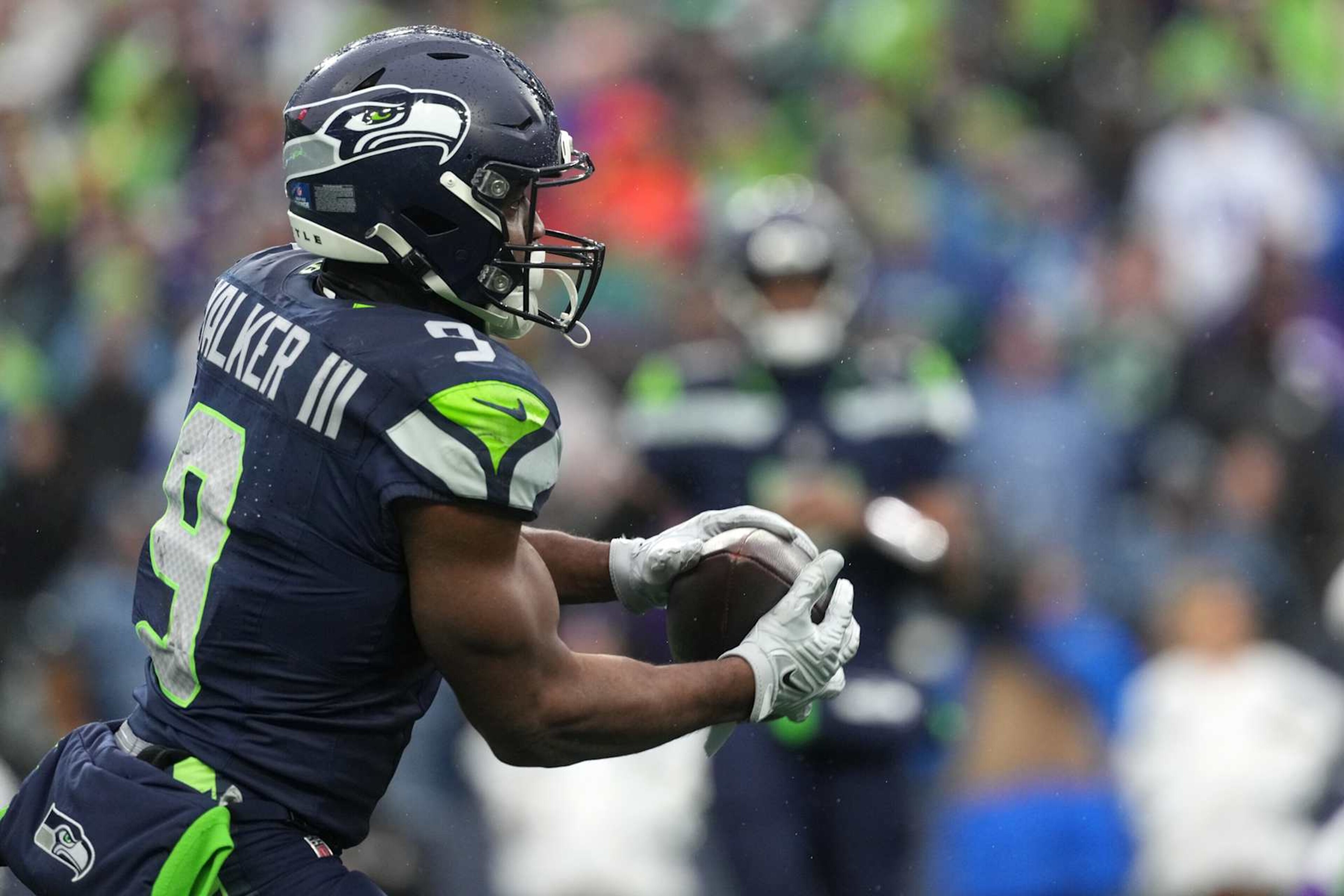 SEATTLE, WASHINGTON - DECEMBER 22: Kenneth Walker III #9 of the Seattle Seahawks catches a pass against the Minnesota Vikings during the second quarter at Lumen Field on December 22, 2024 in Seattle, Washington. (Photo by Christopher Mast/Getty Images) SEATTLE, WASHINGTON - DECEMBER 22: Kenneth Walker III #9 of the Seattle Seahawks catches a pass against the Minnesota Vikings during the second quarter at Lumen Field on December 22, 2024 in Seattle, Washington. (Photo by Christopher Mast/Getty Images)