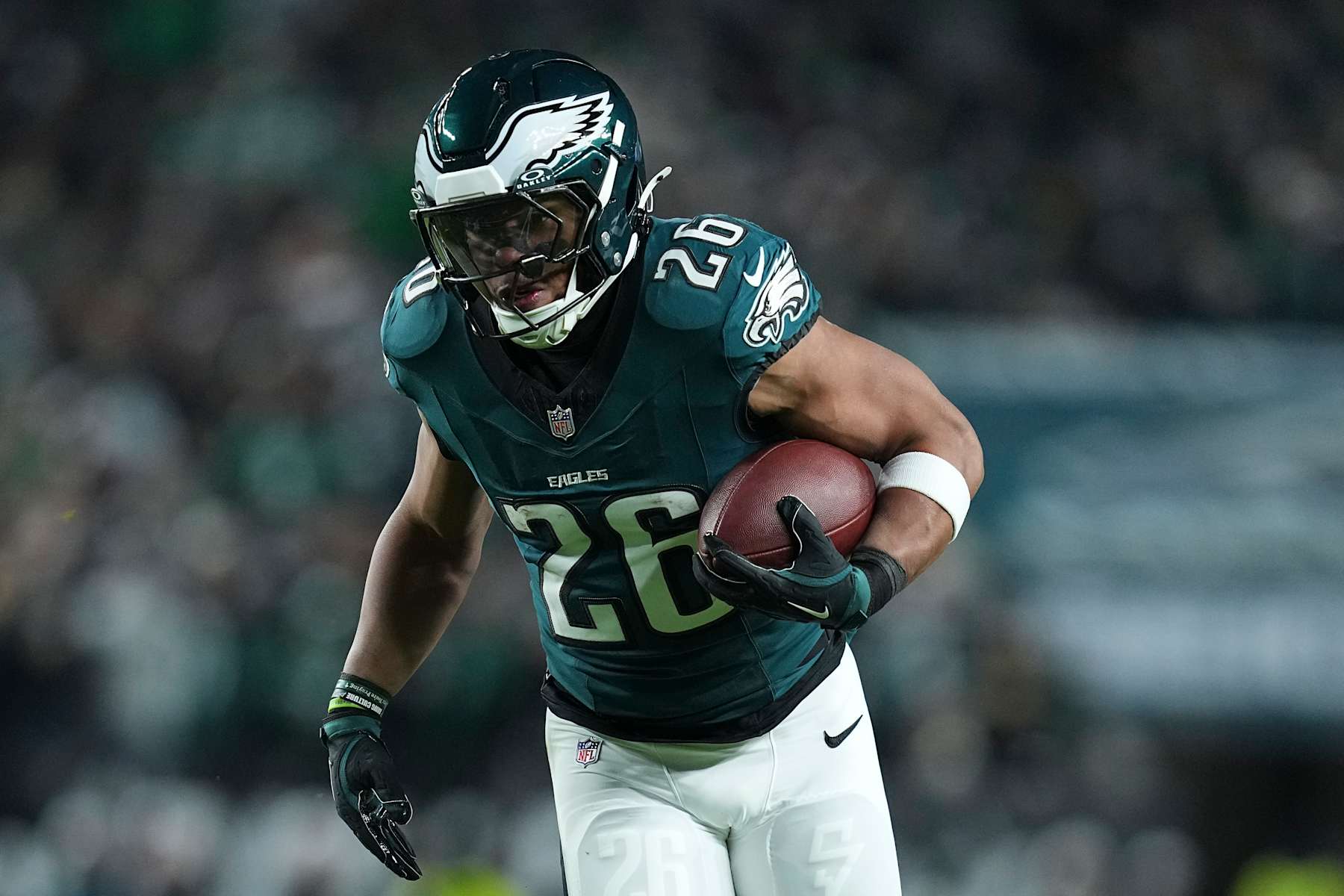 PHILADELPHIA, PENNSYLVANIA - DECEMBER 15: Saquon Barkley #26 of the Philadelphia Eagles runs with the ball against the Pittsburgh Steelers and Philadelphia Eagles at Lincoln Financial Field on December 15, 2024 in Philadelphia, Pennsylvania. (Photo by Mitchell Leff/Getty Images)