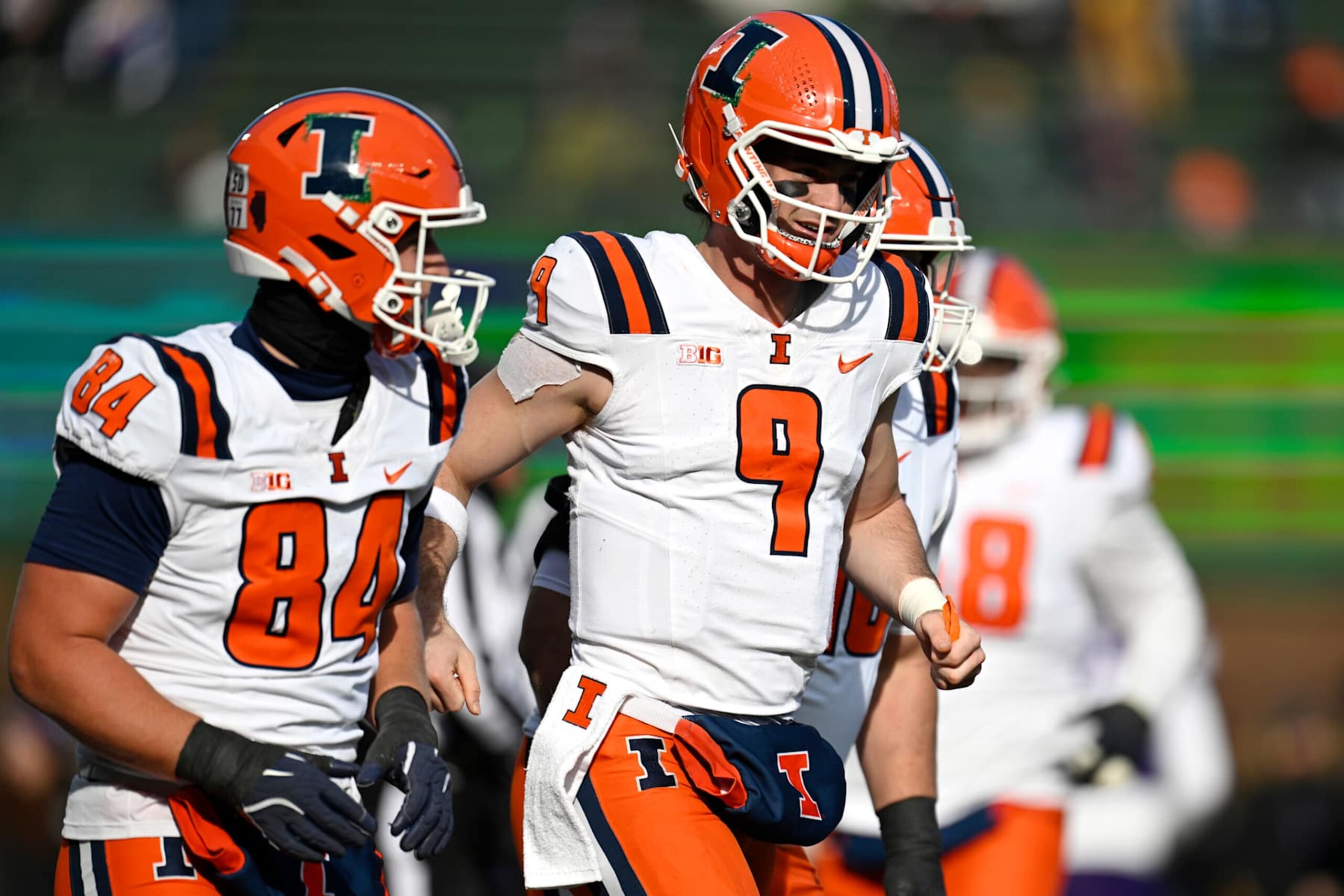 CHICAGO, ILLINOIS - NOVEMBER 30: Luke Altmyer #9 of the Illinois Fighting Illini celebrates after a touchdown in the first half against the Northwestern Wildcats at Wrigley Field on November 30, 2024 in Chicago, Illinois. (Photo by Quinn Harris/Getty Images)