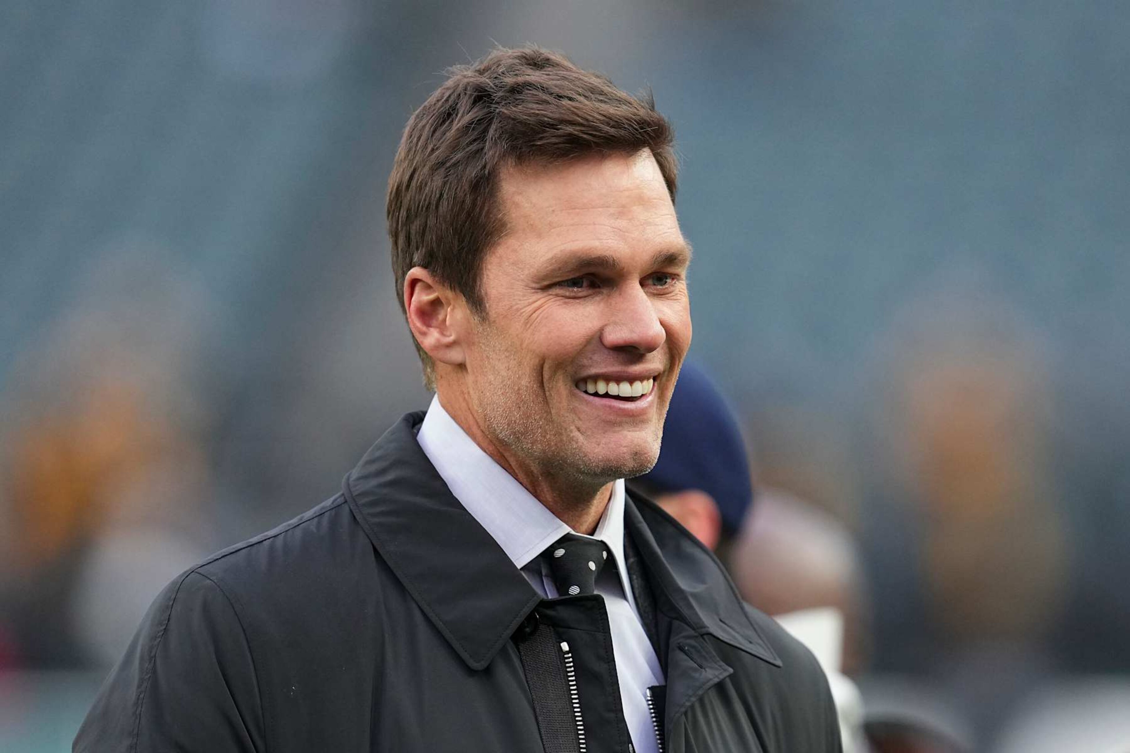 PHILADELPHIA, PENNSYLVANIA - DECEMBER 15: Tom Brady reacts prior to the game between the Pittsburgh Steelers and Philadelphia Eagles at Lincoln Financial Field on December 15, 2024 in Philadelphia, Pennsylvania. (Photo by Mitchell Leff/Getty Images) PHILADELPHIA, PENNSYLVANIA - DECEMBER 15: Tom Brady reacts prior to the game between the Pittsburgh Steelers and Philadelphia Eagles at Lincoln Financial Field on December 15, 2024 in Philadelphia, Pennsylvania. (Photo by Mitchell Leff/Getty Images)