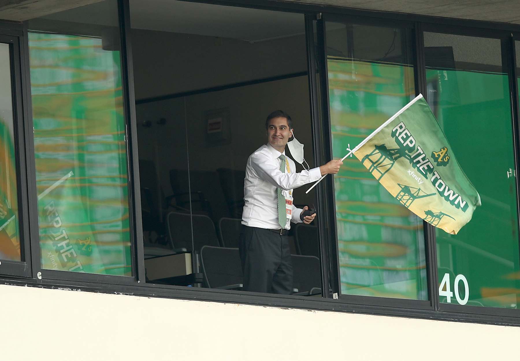 OAKLAND, CALIFORNIA - OCTOBER 01: Oakland Athletics team president Dave Kaval waves a flag after they tied their game against the Chicago White Sox in the fourth inning of Game Three of the American League wild card series at RingCentral Coliseum on October 01, 2020 in Oakland, California. (Photo by Ezra Shaw/Getty Images) OAKLAND, CALIFORNIA - OCTOBER 01: Oakland Athletics team president Dave Kaval waves a flag after they tied their game against the Chicago White Sox in the fourth inning of Game Three of the American League wild card series at RingCentral Coliseum on October 01, 2020 in Oakland, California. (Photo by Ezra Shaw/Getty Images)