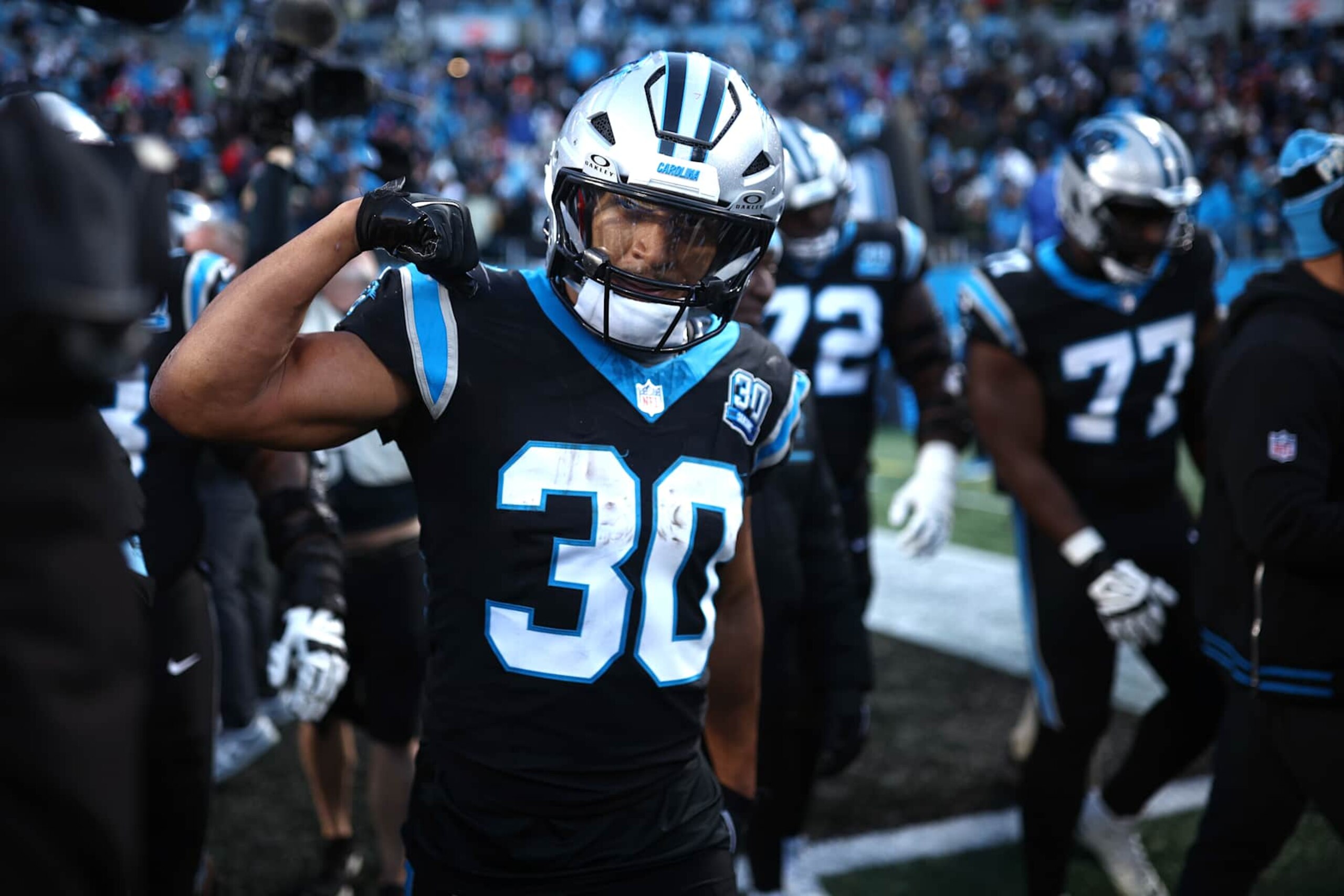 CHARLOTTE, NORTH CAROLINA - DECEMBER 22: Chuba Hubbard #30 of the Carolina Panthers celebrates after scoring a rushing touchdown against the Arizona Cardinals during overtime at Bank of America Stadium on December 22, 2024 in Charlotte, North Carolina. (Photo by Jared C. Tilton/Getty Images) CHARLOTTE, NORTH CAROLINA - DECEMBER 22: Chuba Hubbard #30 of the Carolina Panthers celebrates after scoring a rushing touchdown against the Arizona Cardinals during overtime at Bank of America Stadium on December 22, 2024 in Charlotte, North Carolina. (Photo by Jared C. Tilton/Getty Images)
