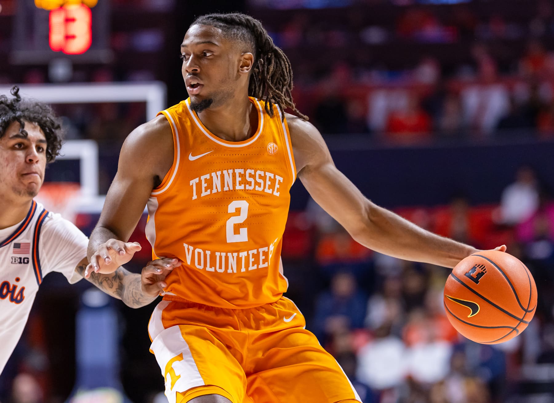 CHAMPAIGN, ILLINOIS - DECEMBER 14: Chaz Lanier #2 of the Tennessee Volunteers brings the ball up court during the game against the Illinois Fighting Illini at State Farm Center on December 14, 2024 in Champaign, Illinois. (Photo by Michael Hickey/Getty Images)