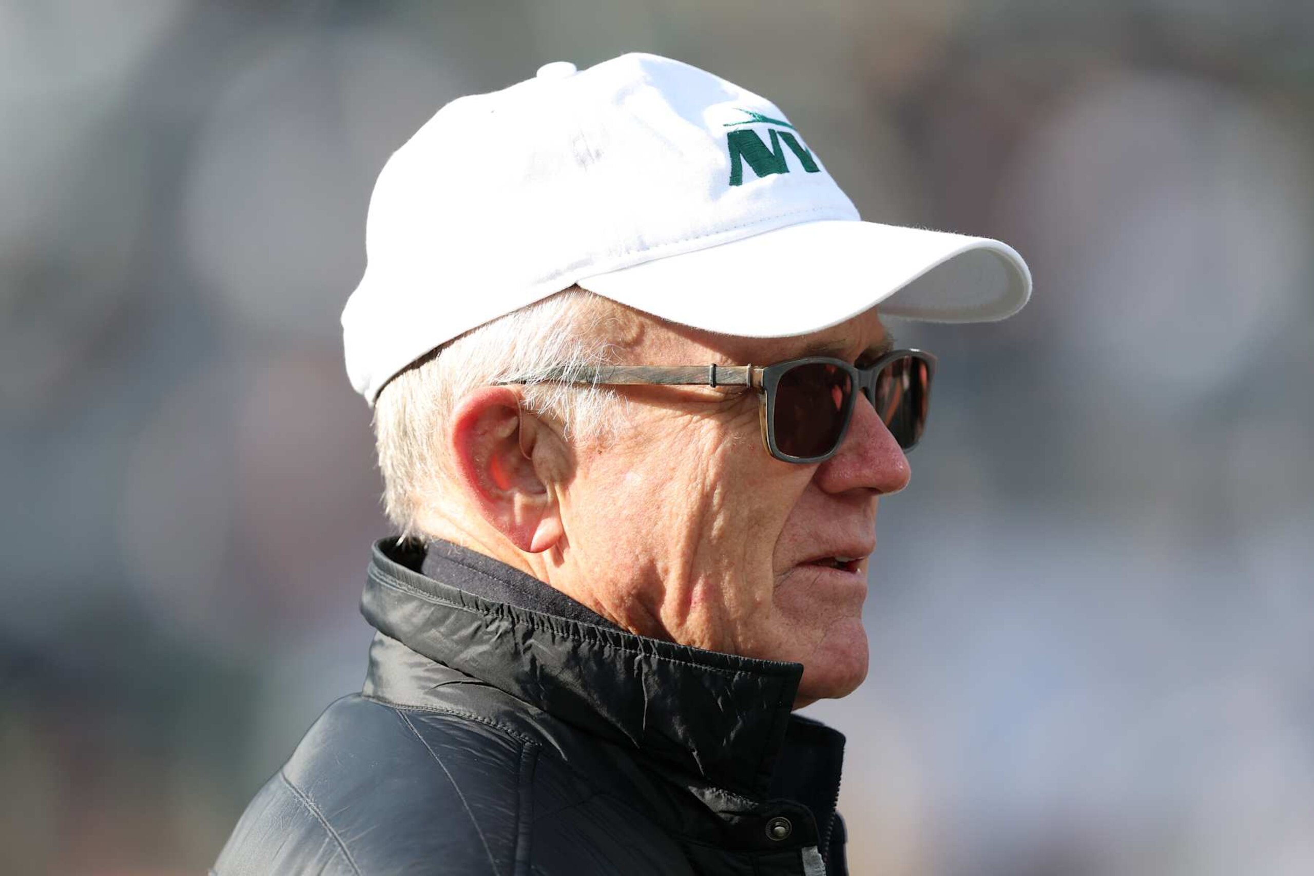 EAST RUTHERFORD, NEW JERSEY - DECEMBER 01: New York Jets owner Woody Johnson looks on before a game between the Jets and the Seattle Seahawks at MetLife Stadium on December 01, 2024 in East Rutherford, New Jersey. (Photo by Elsa/Getty Images)