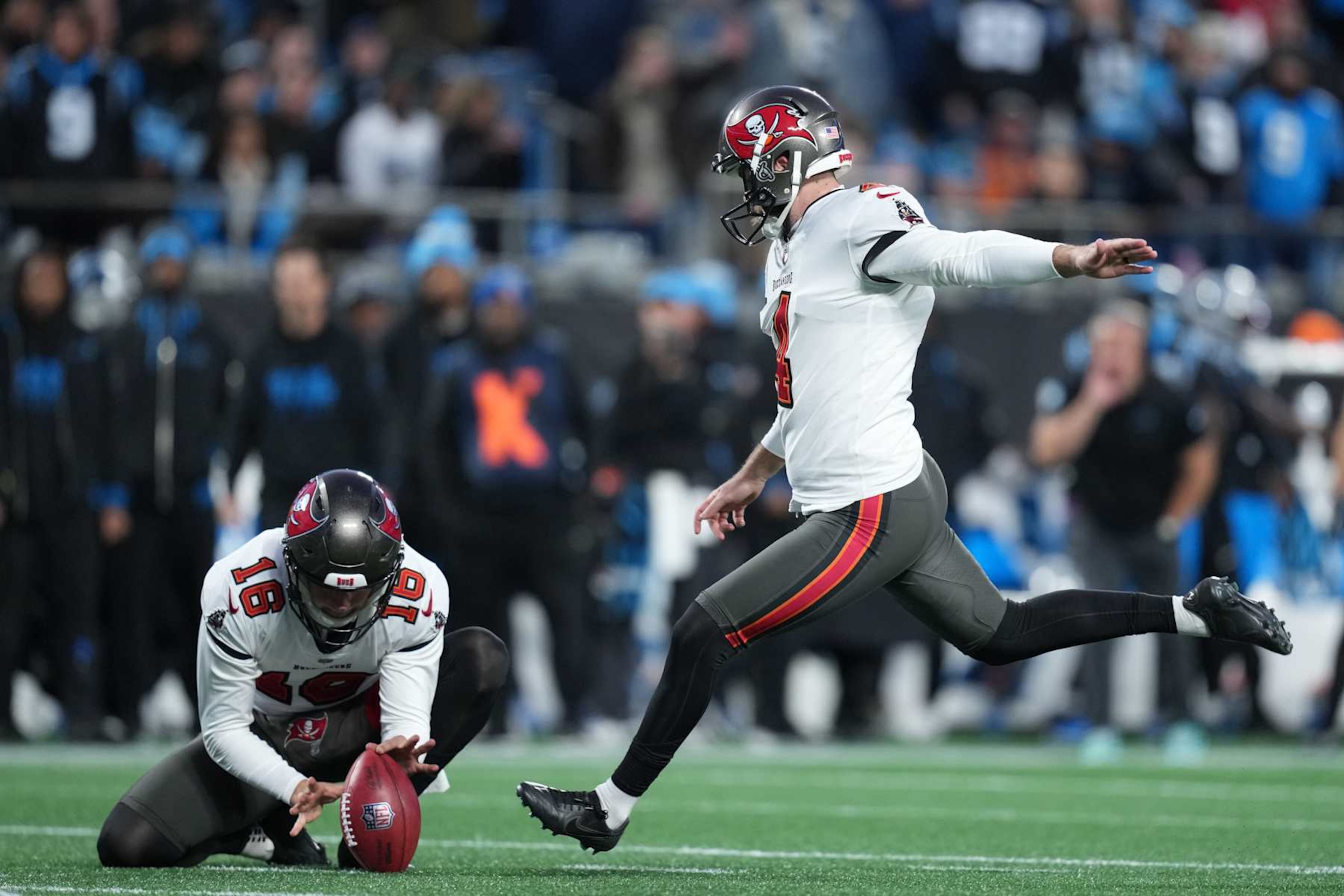 CHARLOTTE, NORTH CAROLINA - DECEMBER 01: Chase McLaughlin #4 of the Tampa Bay Buccaneers kicks a field goal during the second quarter against the Carolina Panthers at Bank of America Stadium on December 01, 2024 in Charlotte, North Carolina. (Photo by Grant Halverson/Getty Images)